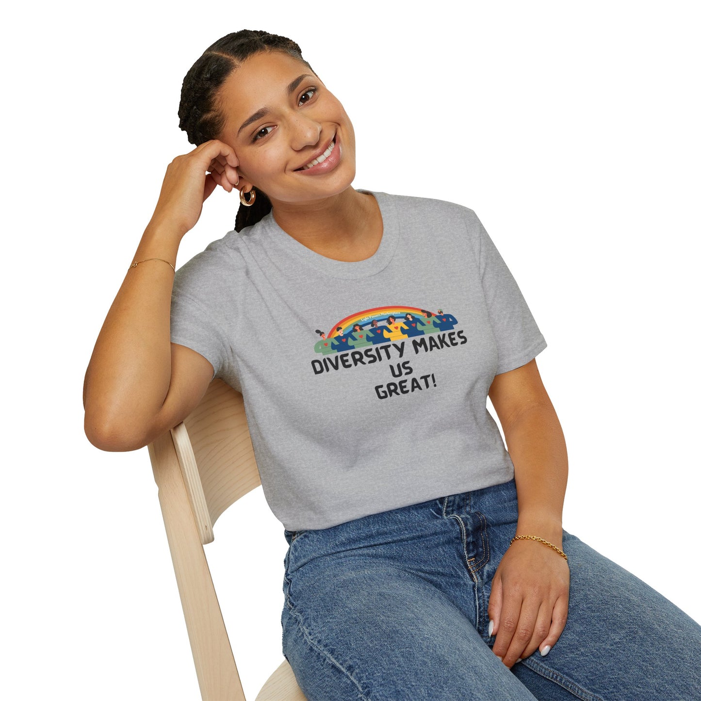 A woman in a grey shirt sits on a chair, smiling, with a hand on her head. Close-up of a hand and face. Unisex heavy cotton tee, foundational wardrobe piece for personalized designs.