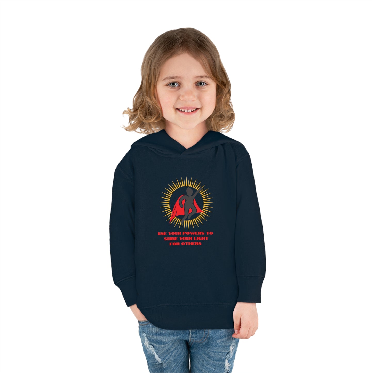 A smiling child in a blue logo hoodie with side pockets, cover-stitched details, and a jersey-lined hood. Made of 60% cotton, 40% polyester for cozy durability.