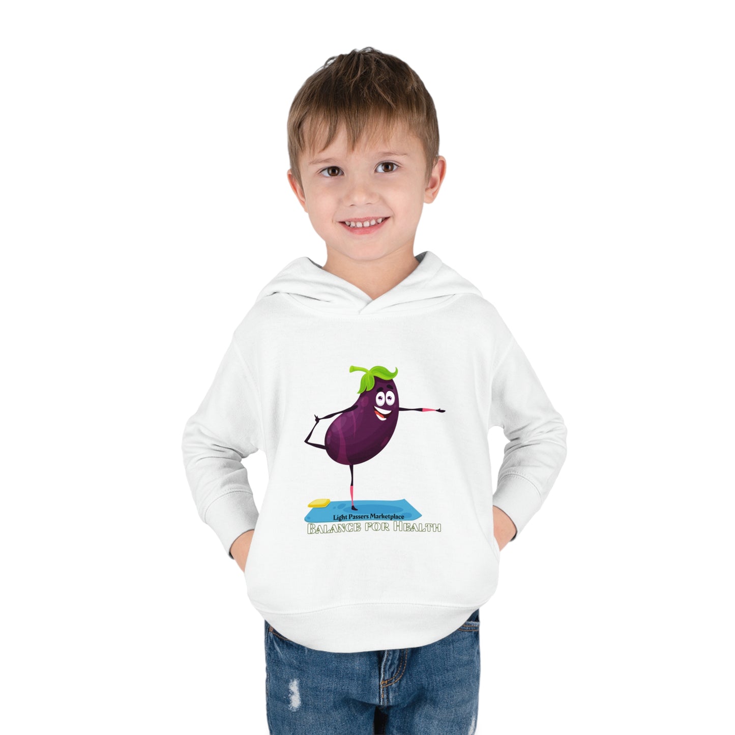 A toddler wearing a white hoodie with a cartoon eggplant design, showcasing side-seam pockets and durable construction. Ideal for comfort and style with cover-stitched details and a cozy hood.