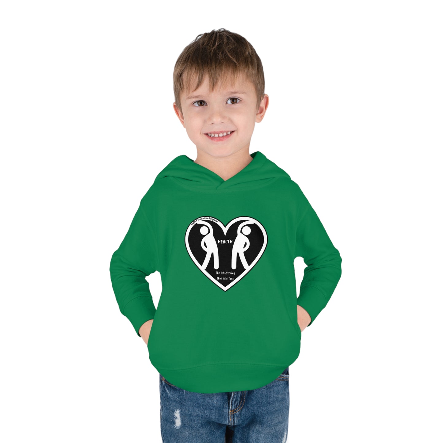 A toddler in a green hoodie with a heart and figures design, featuring side-seam pockets and durable fabric for active play.