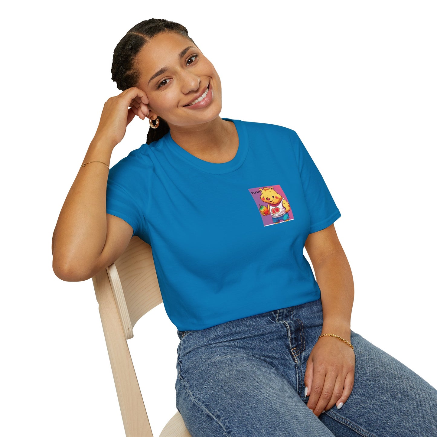 A woman in a blue shirt sits on a chair, showcasing the Yum Strawberries Unisex T-Shirt. Made of soft, 100% cotton with twill tape shoulders for durability. No side seams for comfort.
