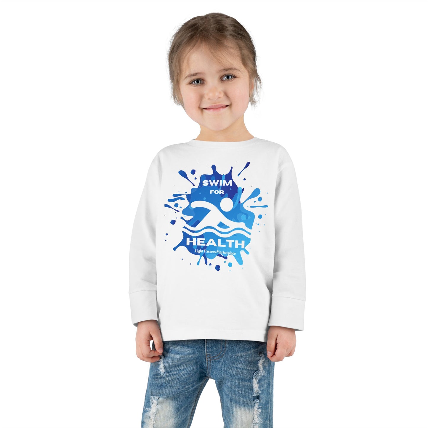 Toddler wearing Health Toddler Long Sleeve Swim for Health shirt, featuring blue paint splashes, ideal for beach or pool play, ensures comfort with ribbed collar and cuffs.
