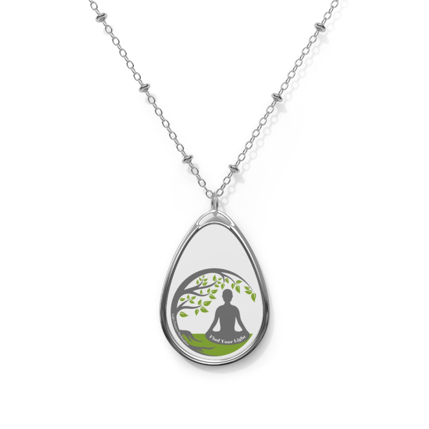 Silver chained necklace featuring an oval pendant with a meditating figure, crafted from zinc alloy and aluminum, ideal for personalizing and enhancing your accessory collection.