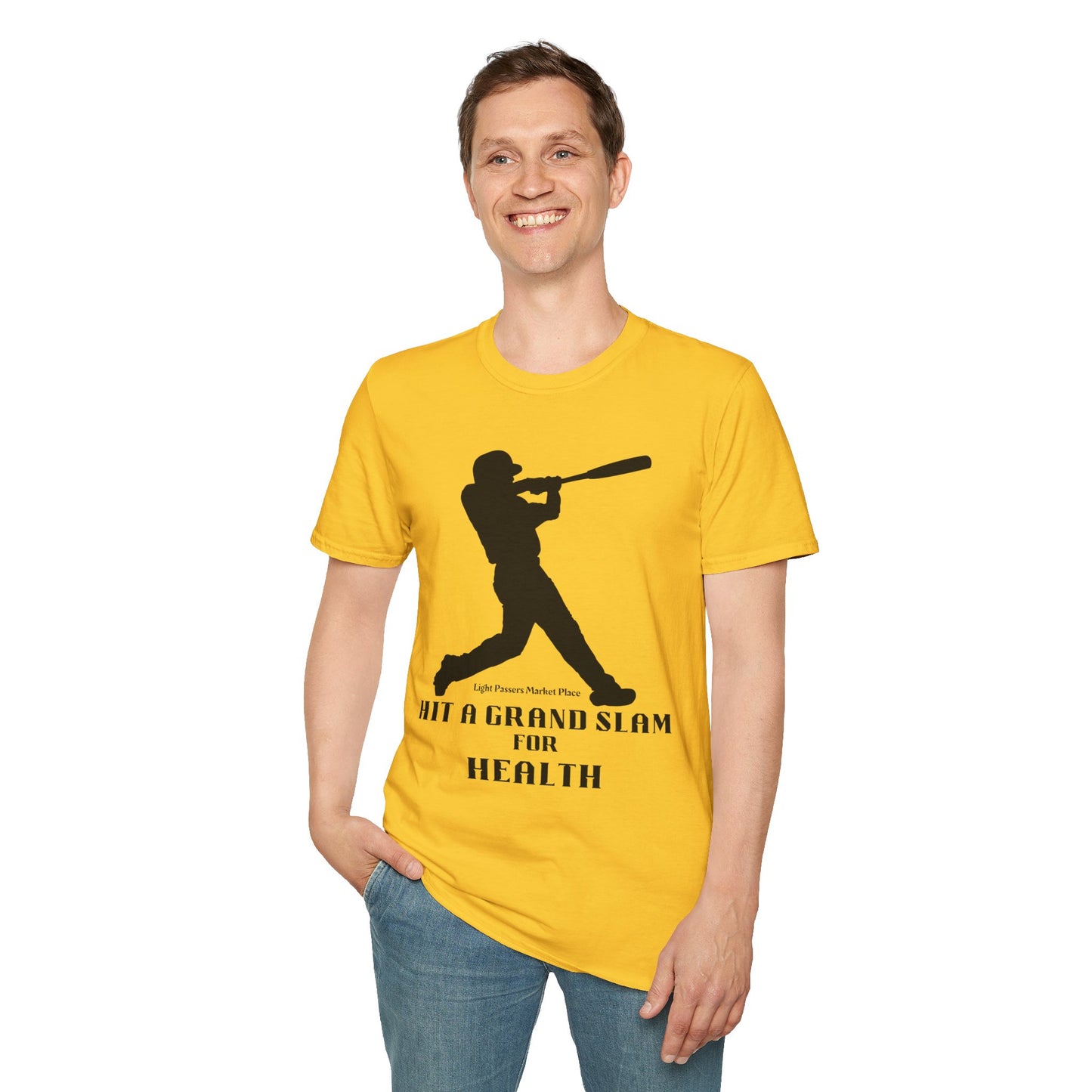 A person in a yellow Grand Slam For Health unisex t-shirt, holding a bat. Made of soft 100% cotton, featuring twill tape shoulders for durability and a ribbed collar. Ethically sourced and Oeko-Tex certified.