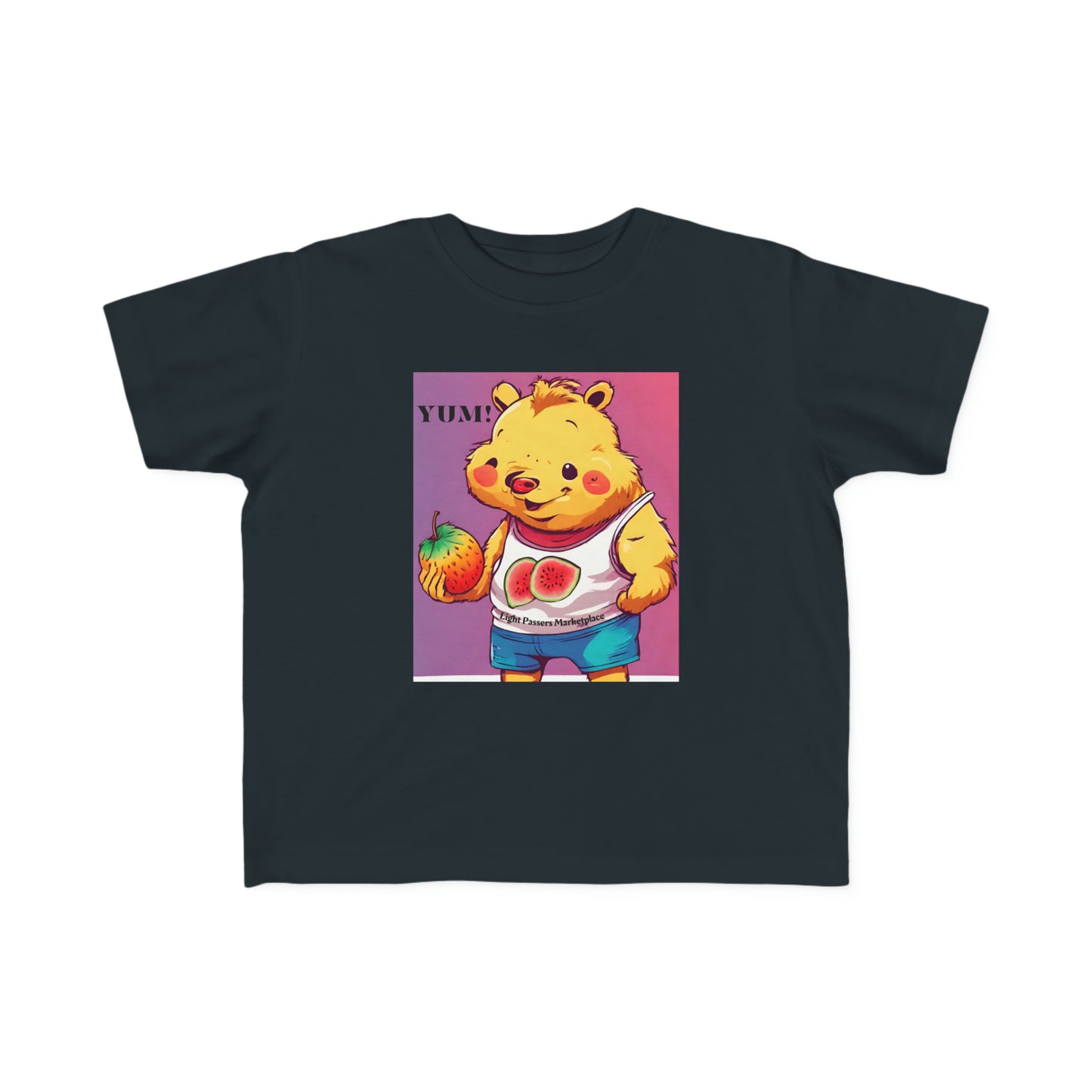 A toddler's black tee featuring a cartoon bear holding a fruit, ideal for sensitive skin. Made of 100% combed cotton, light fabric, and a durable print.