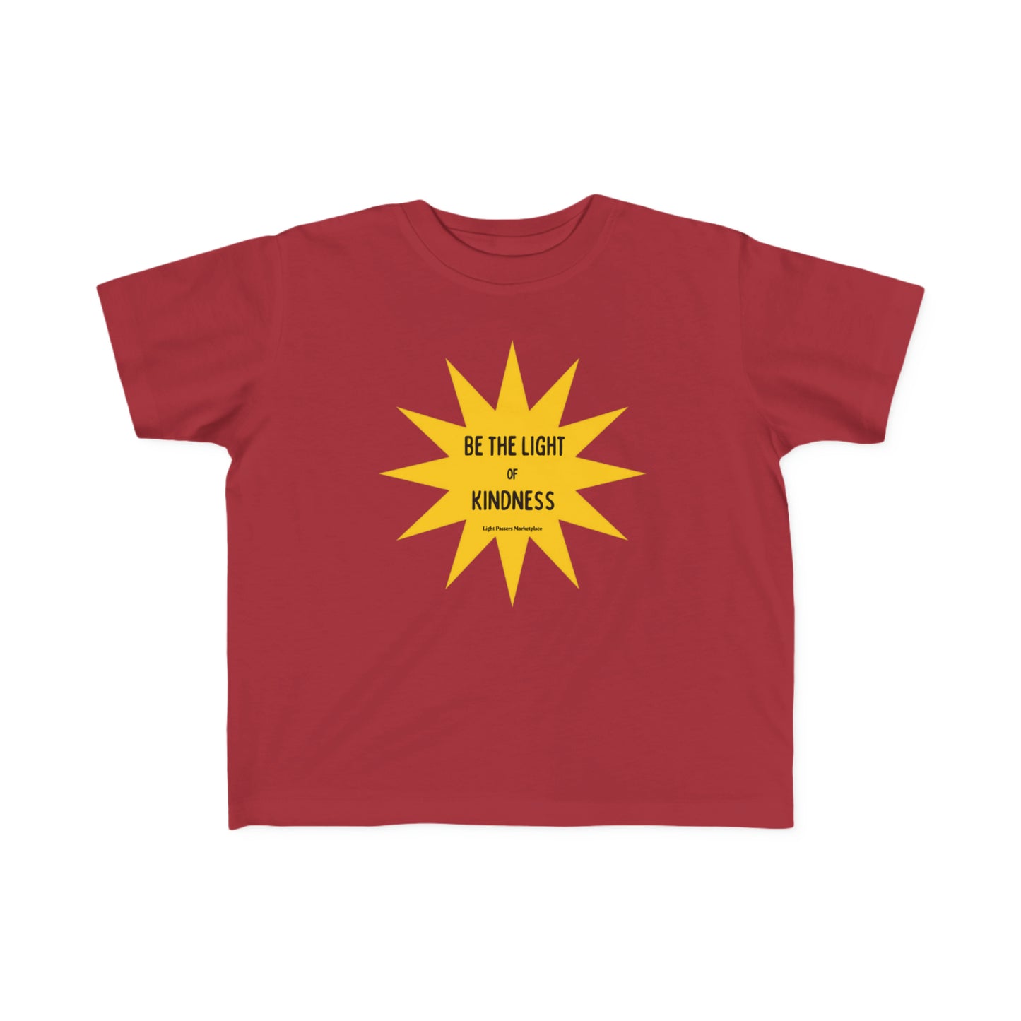 A toddler tee featuring a yellow star with black text, symbolizing kindness. Made of soft, durable cotton with a high-quality print, perfect for little ones.
