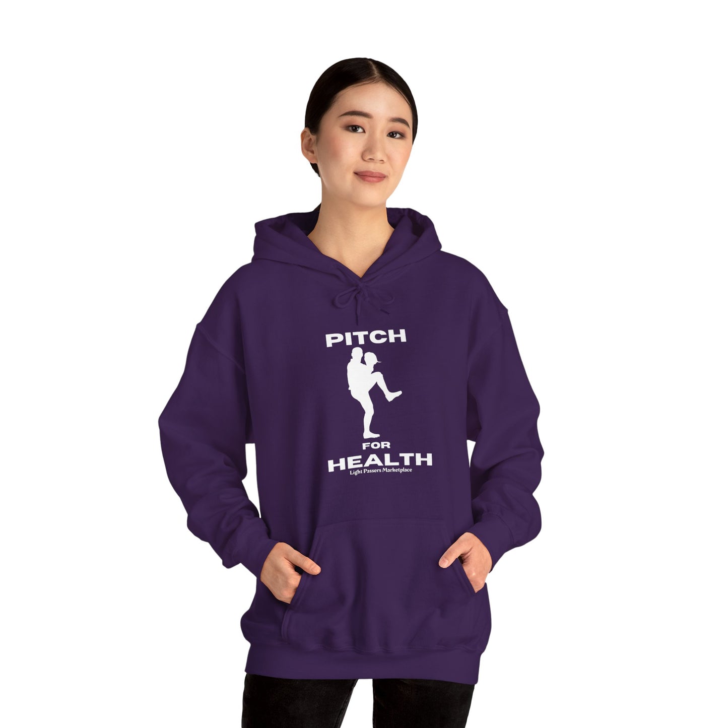 A person wearing a purple unisex hooded sweatshirt with a kangaroo pocket and color-matched drawstring. Made of 50% cotton and 50% polyester for warmth and comfort.
