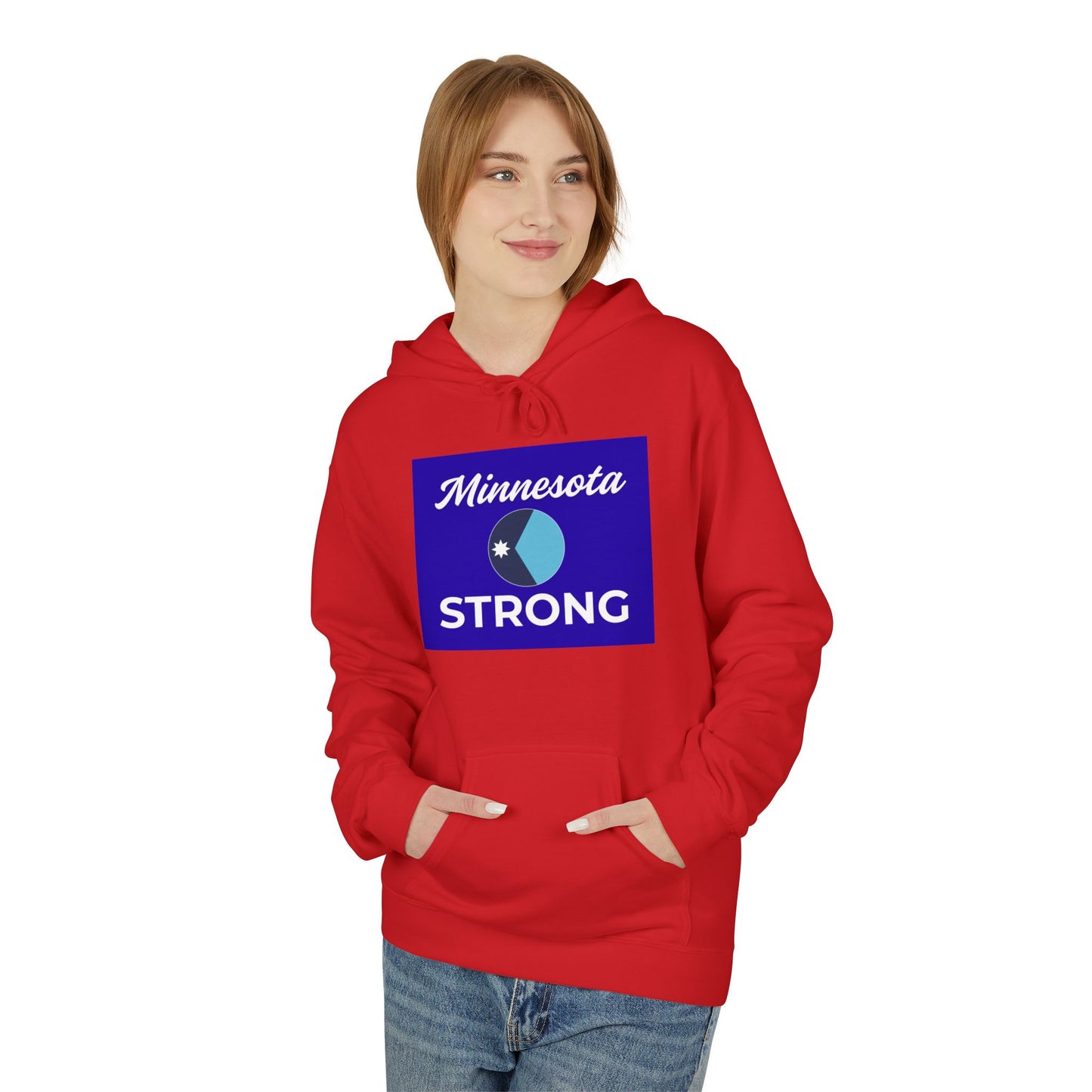 Young woman in a red Love and Peace The Light Minnesota Strong hoodie, featuring Minnesota-themed graphic, smiling gently with hands in pocket against a white background.