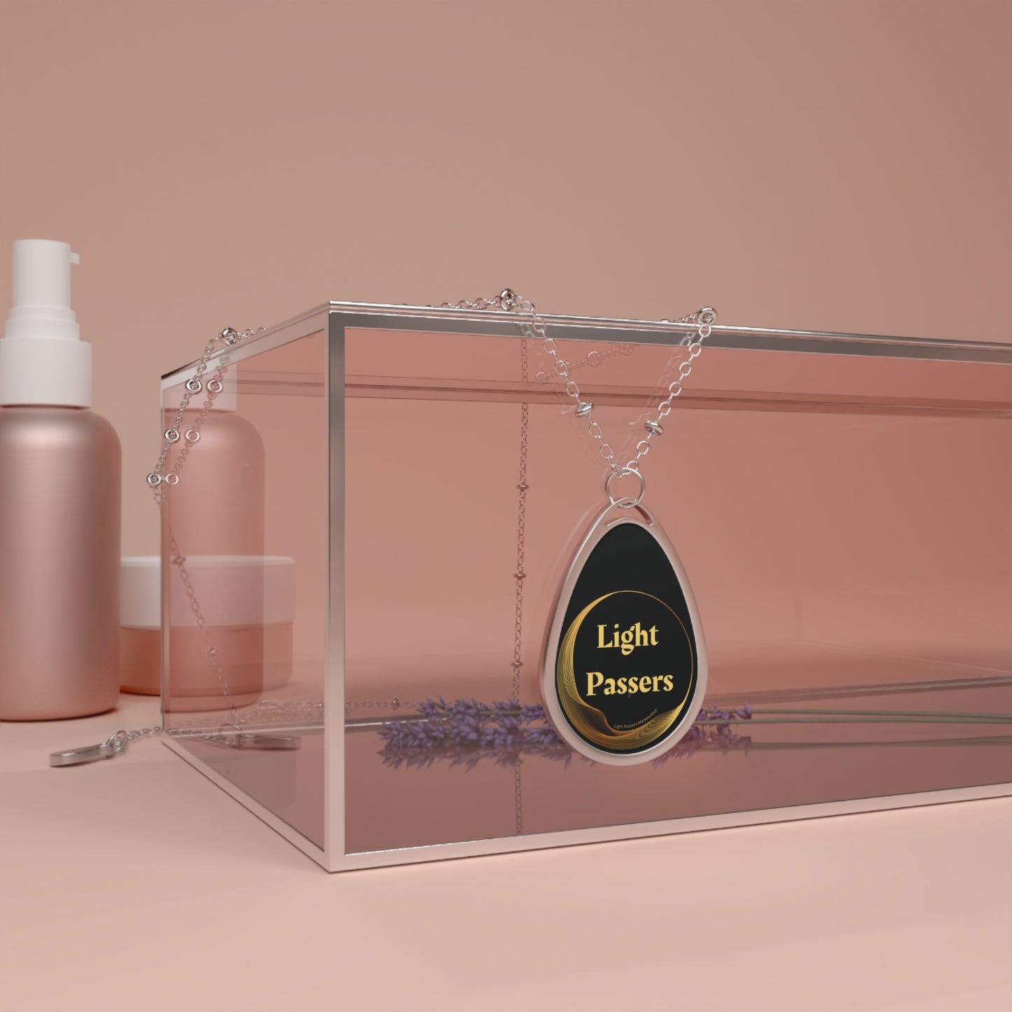 Necklace - Light Passers Mission Logo Cool Stuff Accessories displayed in a glass box with a lavender flower, symbolizing hope and unity.