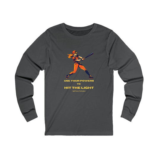 Long Sleeve Girl Use Your Powers to Hit the Light Unisex tee featuring a baseball player with a bat, offering a motivational and empowering vibe.