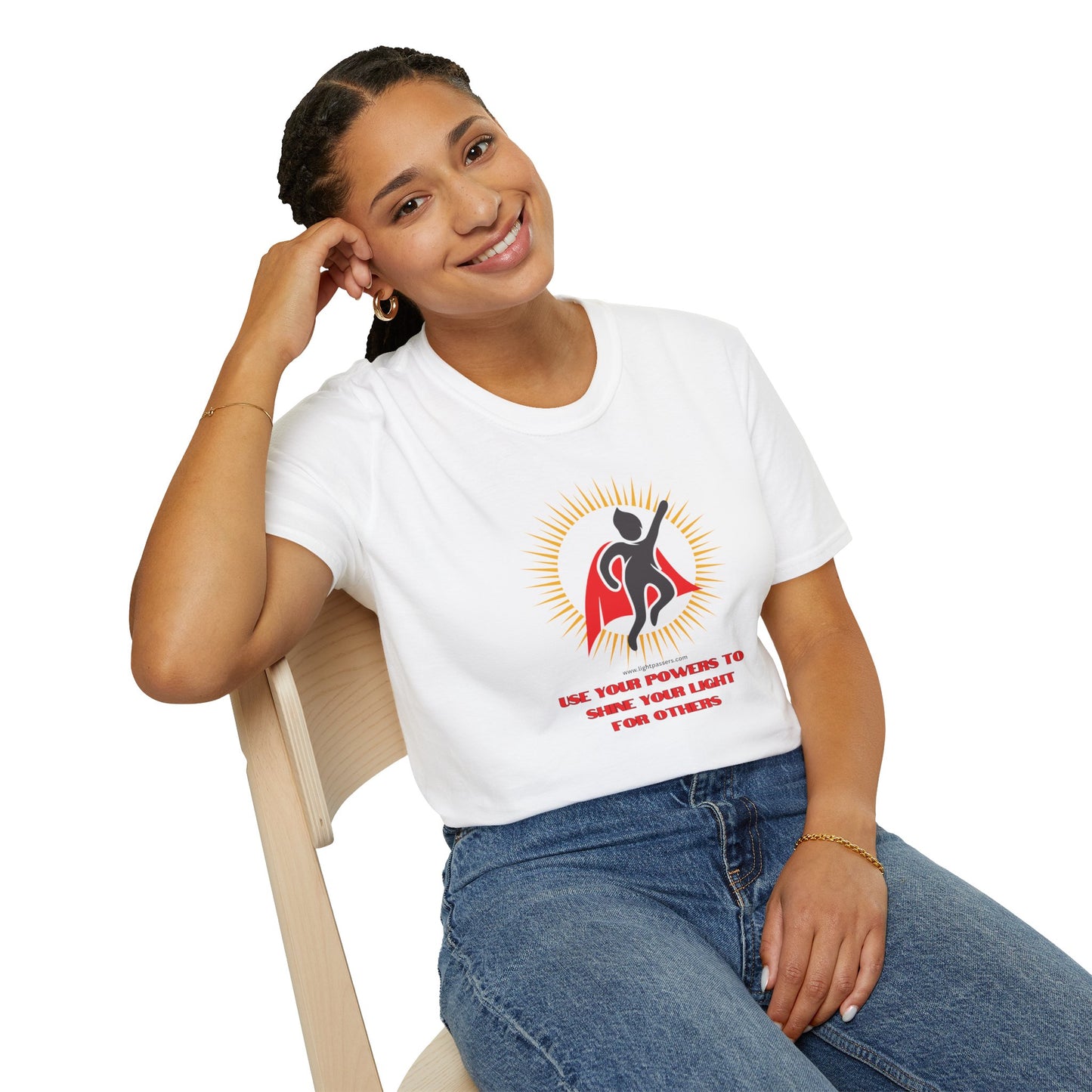 A woman in a white shirt smiles, sitting on a chair, showcasing the Use Your Powers Unisex T-shirt. The tee offers a classic fit, 100% cotton, tear-away label, and durable shoulder tape.