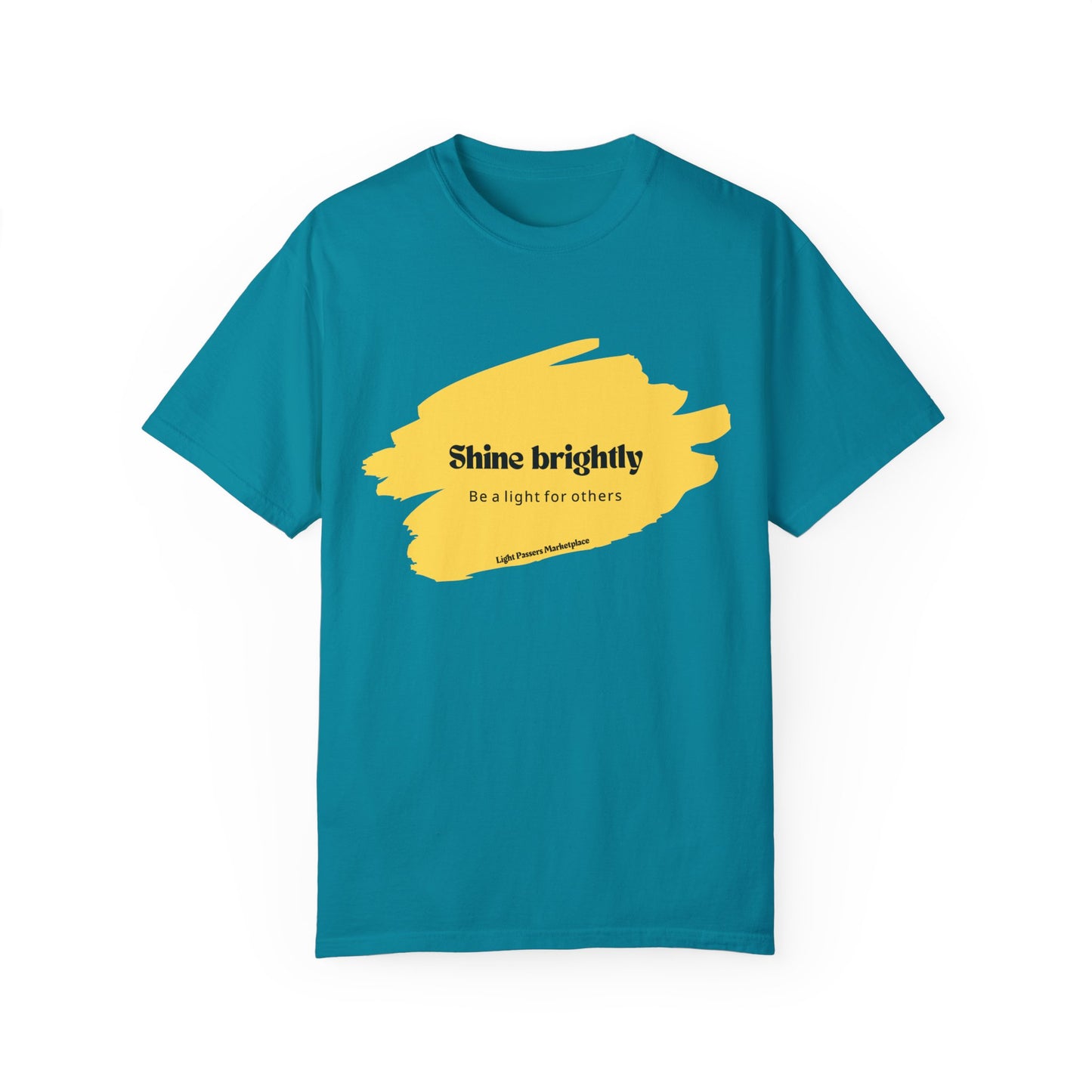 The Light Shine Brightly for Others Inspirational Design Adult Unisex T-shirt with yellow text and paint splashes on a blue background, featuring a crew neckline.