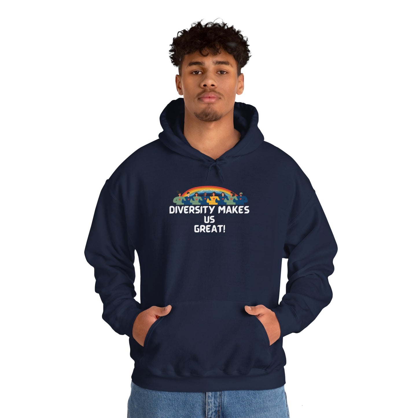 A man in a blue hooded sweatshirt with hands in pockets, showcasing the Diversity Makes Us Great Unisex Hooded Sweatshirt. Made of cotton and polyester, featuring a kangaroo pocket and color-matched drawstring.