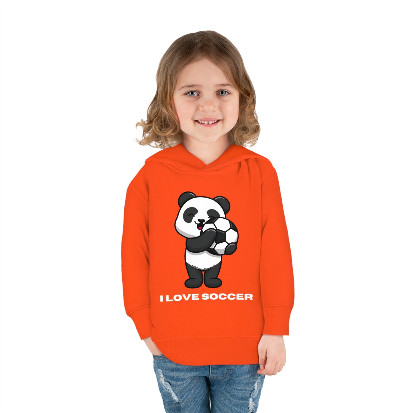 A toddler in an orange hoodie with a panda playing soccer, showcasing cover-stitched details and side-seam pockets for lasting comfort and durability.