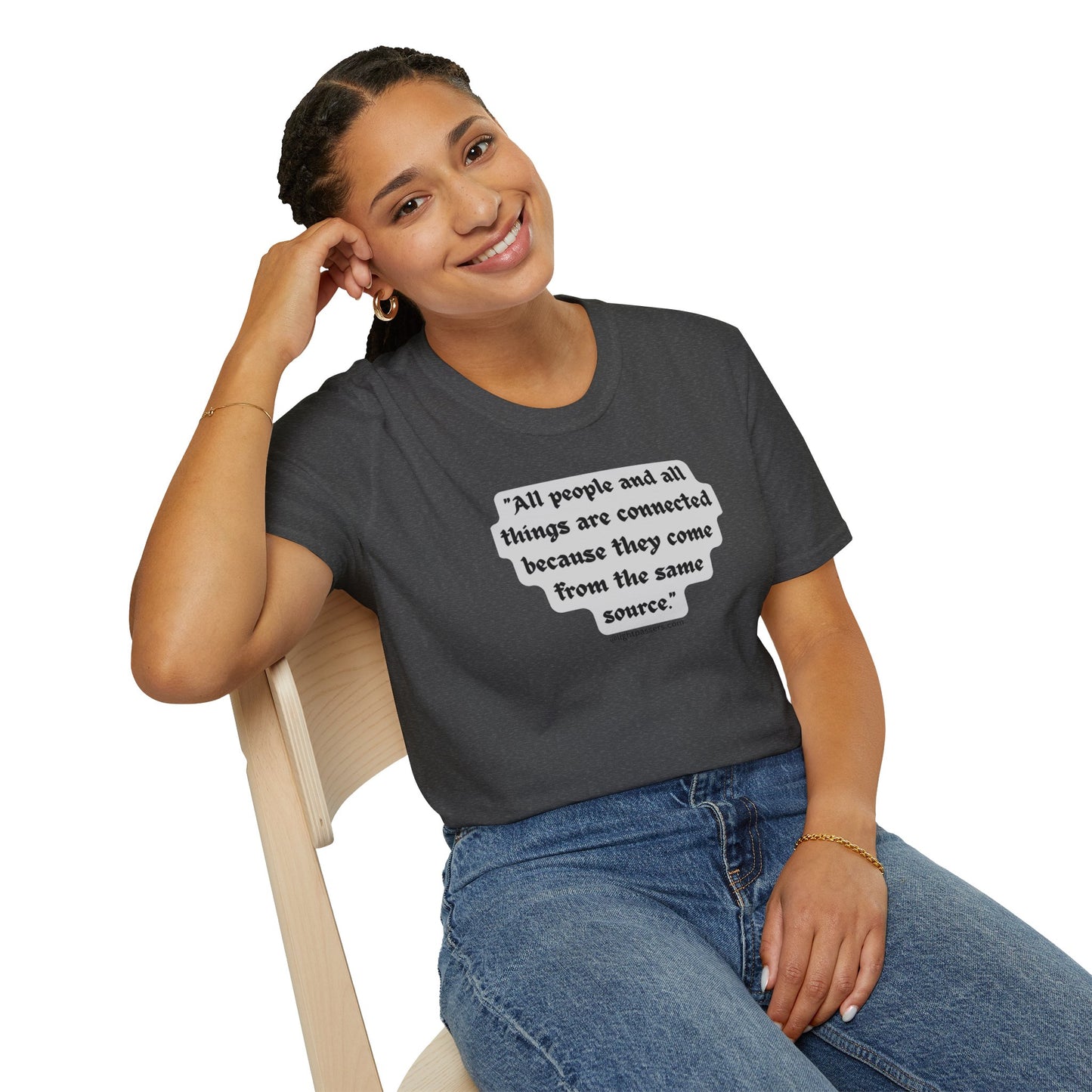 A woman in a gray T-shirt sits on a chair, showcasing the All People are Connected design. Unisex heavy cotton tee with smooth surface for vivid printing, no side seams, and tape on shoulders for durability.