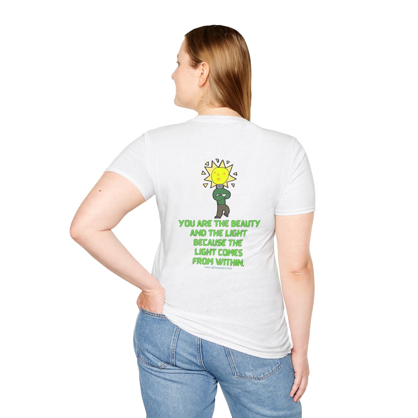 A unisex heavy cotton tee featuring a woman in a white shirt with a cartoon character, a light bulb drawing, and a close-up of a sign.