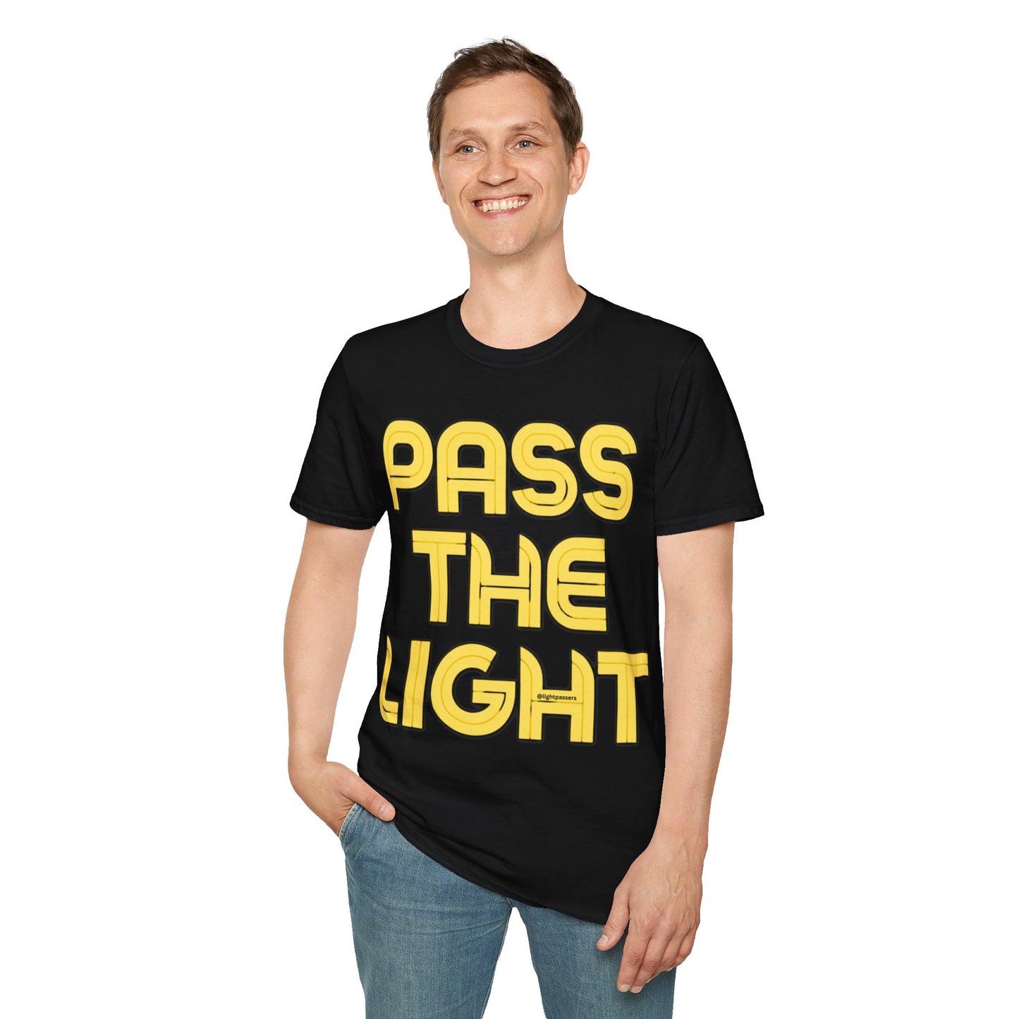 A smiling man in a PASS THE LIGHT Unisex T-shirt with yellow text. Classic fit, 100% cotton tee without side seams for comfort. Premium print quality.