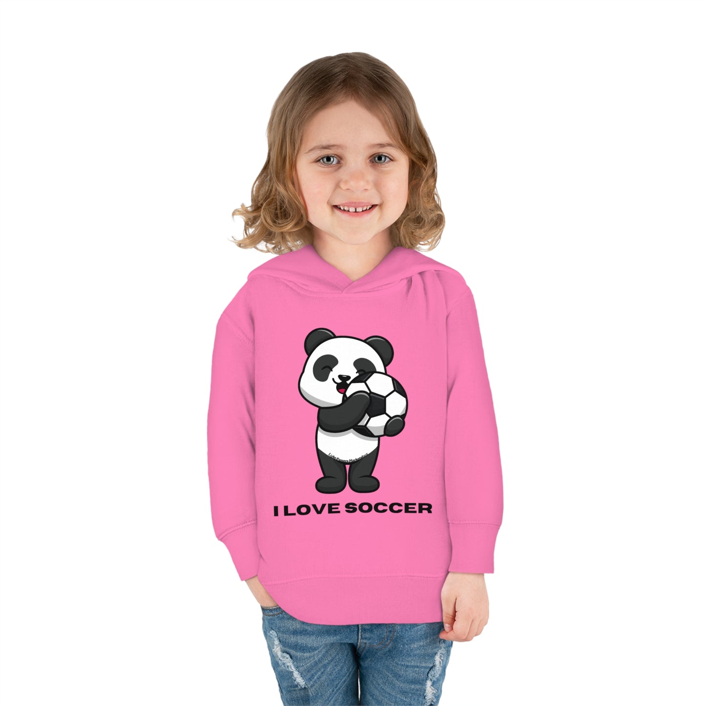 A toddler in a pink hoodie with a cartoon panda holding a football ball. Features jersey-lined hood, cover-stitched details, side seam pockets, and durable fabric blend for cozy wear.