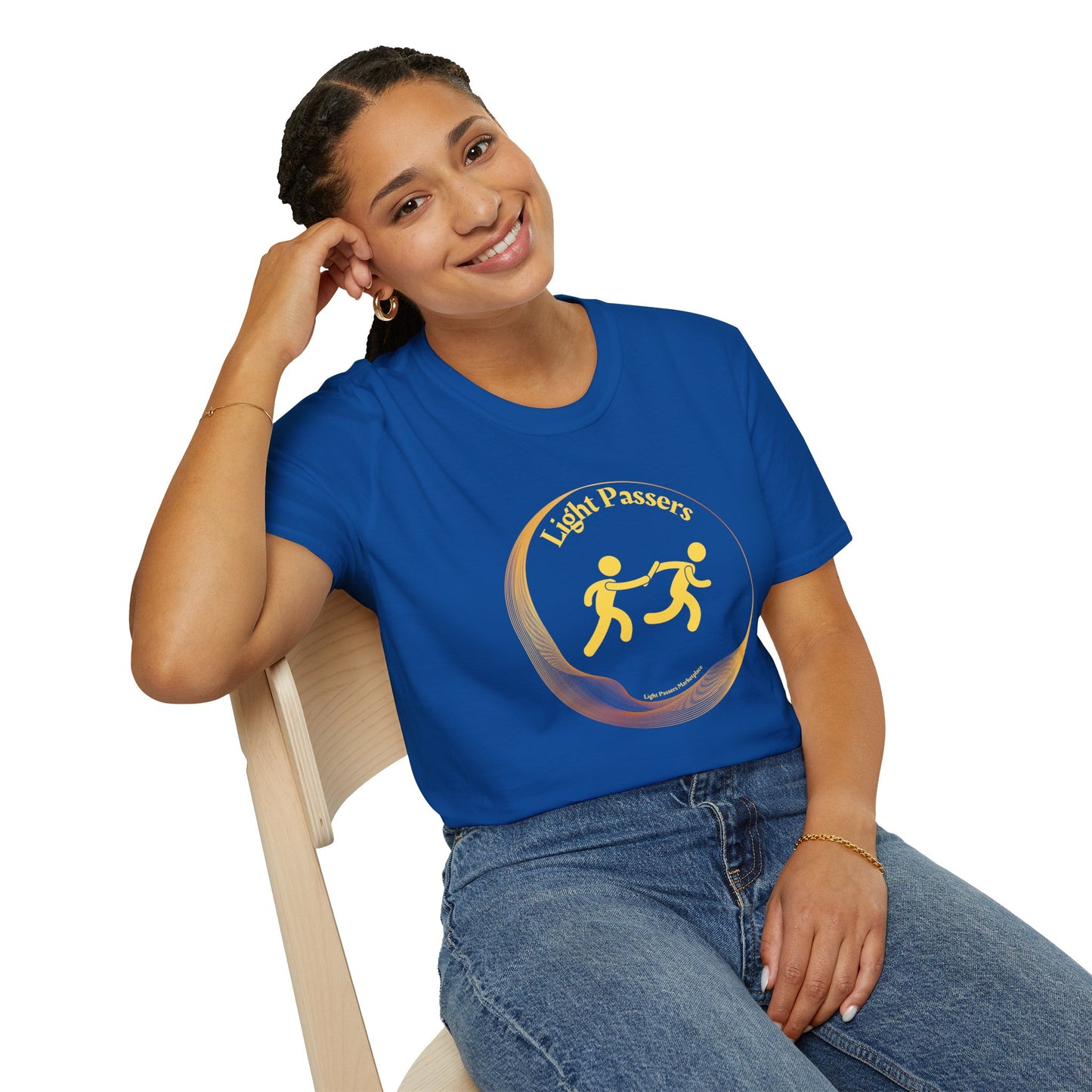 A smiling woman in a blue shirt sits on a chair, showcasing the Light Passers Relay Logo Unisex T-shirt. The image emphasizes the tee's classic fit, 100% cotton fabric, and tear-away label for comfort and style.