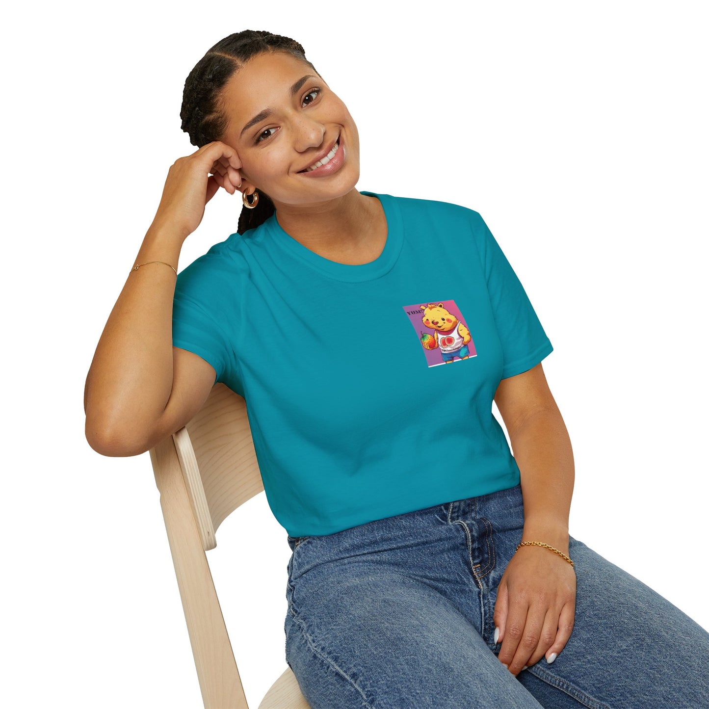 A woman in a blue shirt sits on a chair, showcasing the Yum Strawberries Unisex T-Shirt. Made of soft 100% cotton, with twill tape shoulders for durability and a clean crew neckline for versatile style.