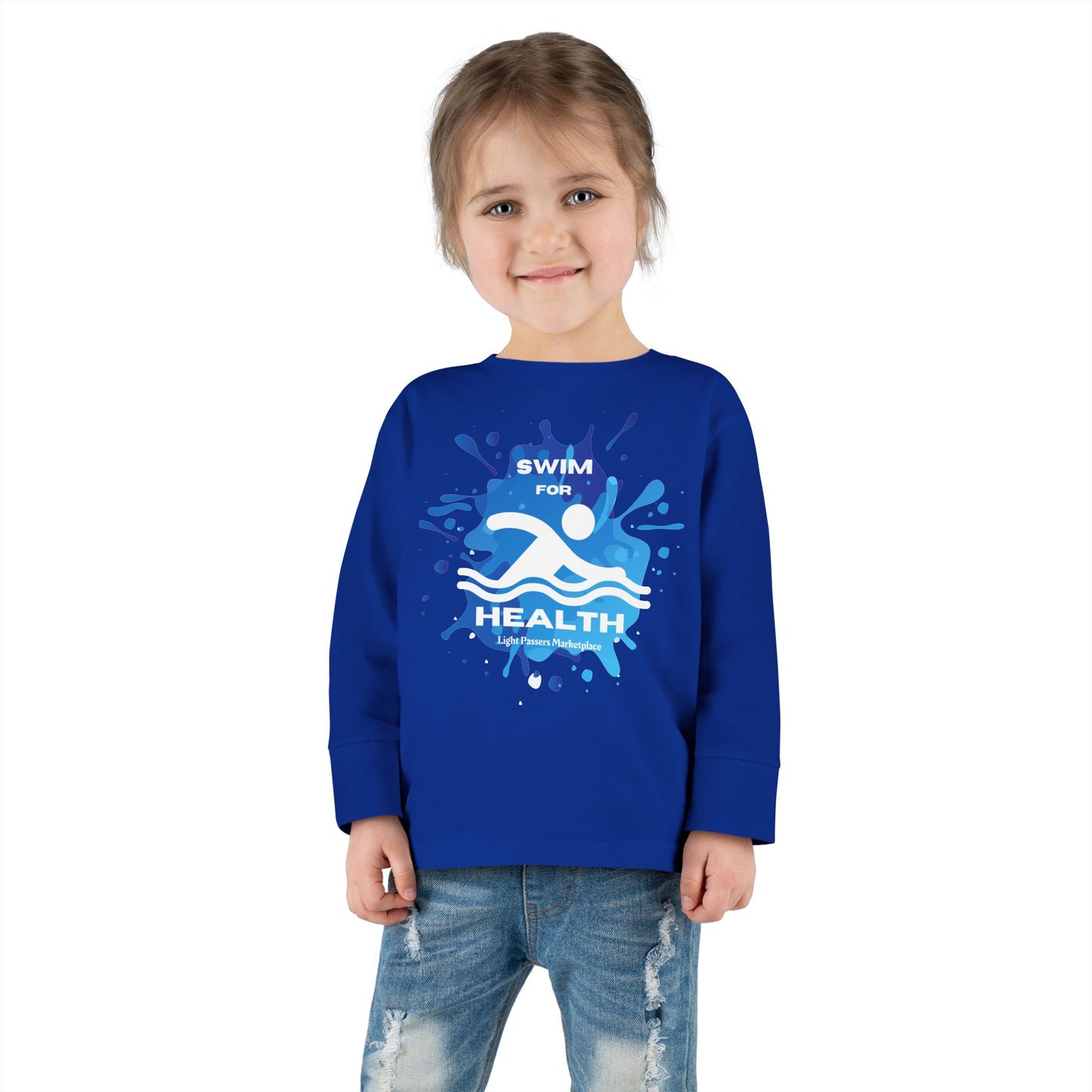 Toddler wearing the Health Toddler Long Sleeve Swim for Health tee, ideal for beach or pool, featuring side seams, ribbed collar, and cuffs for comfort.