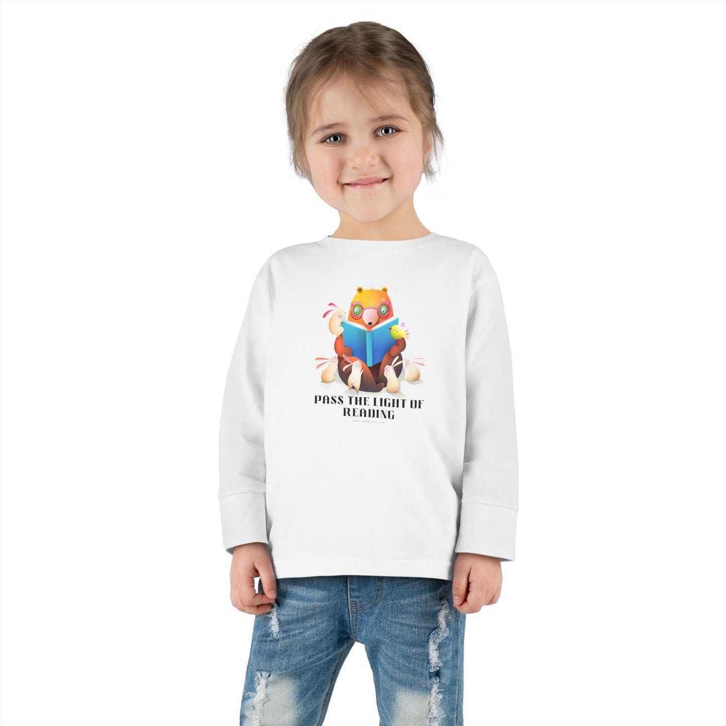 Toddler Long Sleeve Pass the Light of Reading tee featuring a bear reading with bunnies, highlighting durable ribbed collar and tear-away label for comfort.