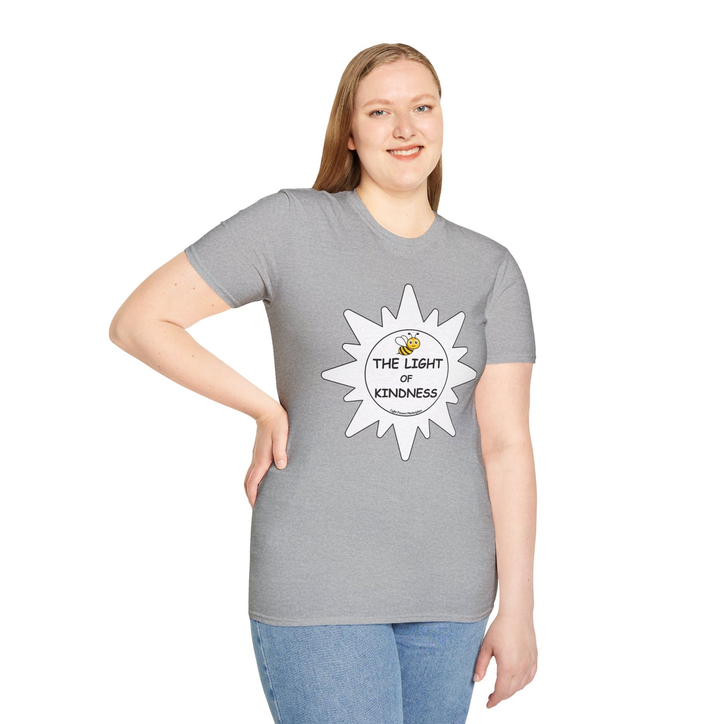 A woman in a grey shirt smiles, showcasing the BEE the Light of Kindness white star Unisex T-shirt. Close-up of blue jeans. Casual, 100% cotton tee with no side seams for comfort.