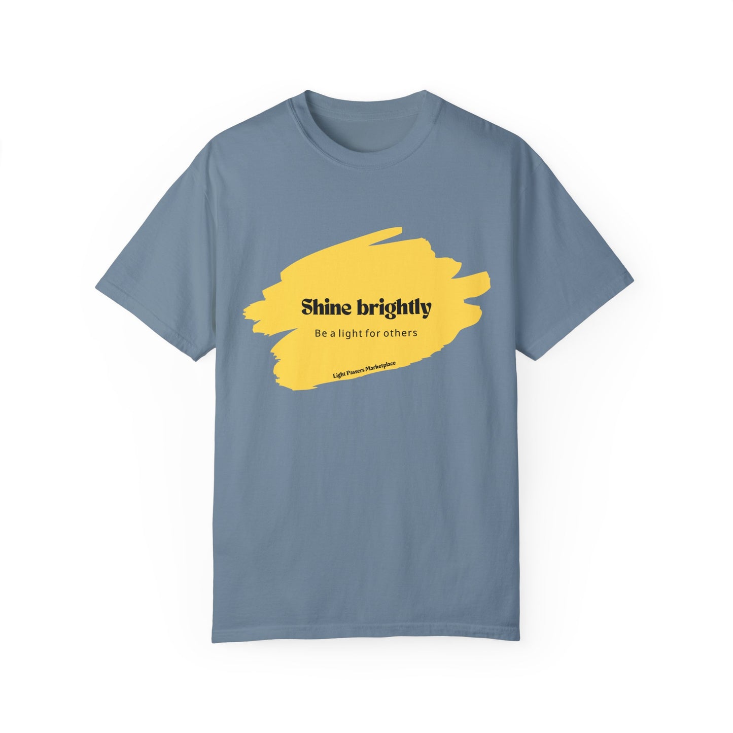 The Light Shine Brightly for Others Inspirational Design Adult Unisex T-shirt with yellow paint stroke on blue fabric, relaxed fit, crew neckline.