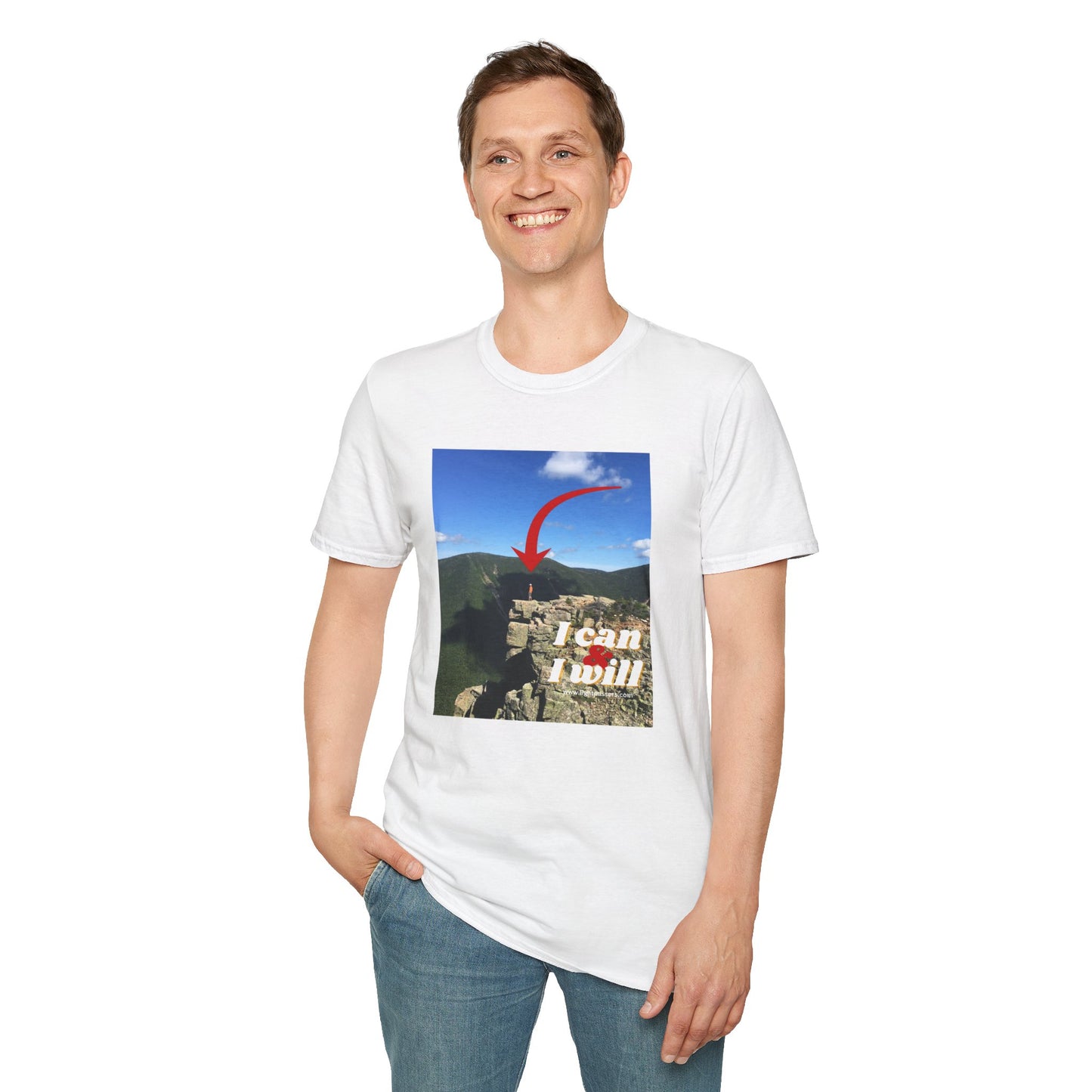 A person in a white shirt and blue jeans standing confidently on a rock, embodying the spirit of Hiking I Can and I Will Unisex T-Shirt.