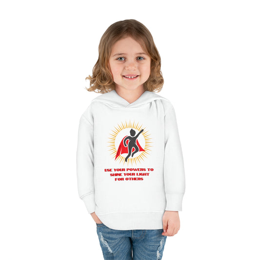 A toddler in a white Rabbit Skins hoodie with a logo, smiling. Features jersey-lined hood, cover-stitched details, and side pockets for comfort and durability.