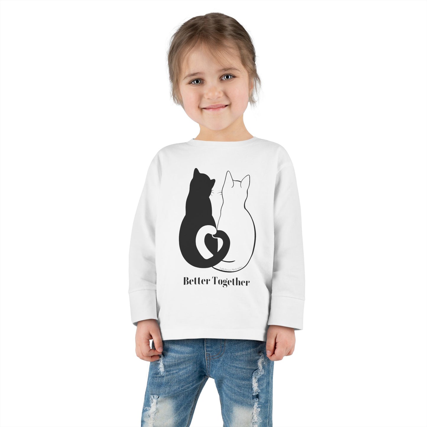 Toddler wearing Better Together Cat Love Tails Long Sleeve, showcasing playful cat design on 100% cotton fabric, emphasizing comfort and durability.