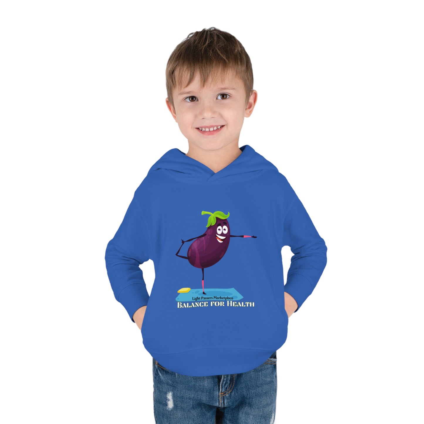 A toddler in a blue hoodie with a cartoon eggplant design, showcasing Rabbit Skins' durable, cozy features like double-needle hem hood and side seam pockets for long-lasting comfort.