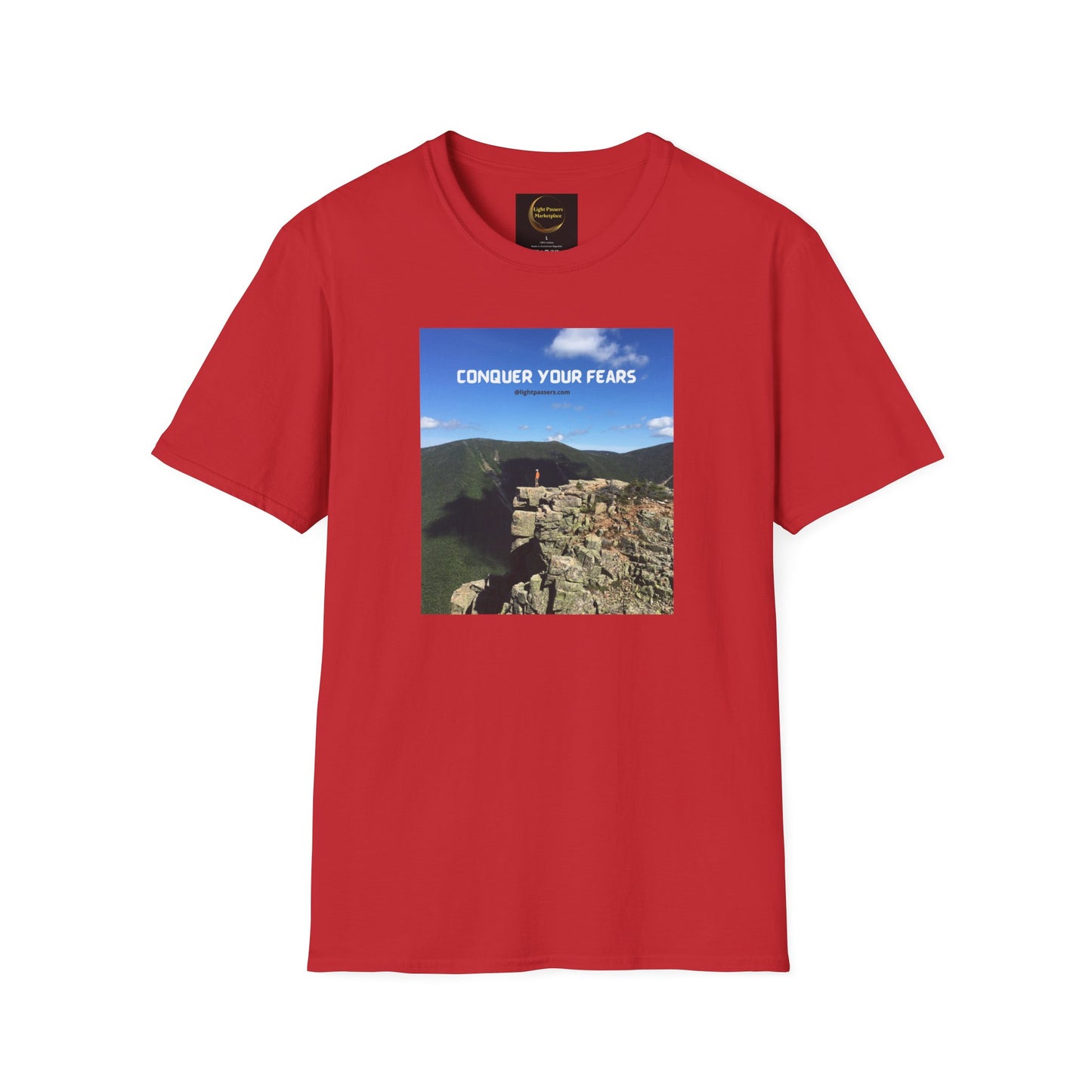Unisex Conquer Your Fears Hiking T-shirt featuring a person on a cliff, red shirt with a mountain design. 100% cotton, no side seams, smooth surface for vivid prints. Classic fit, tear-away label.