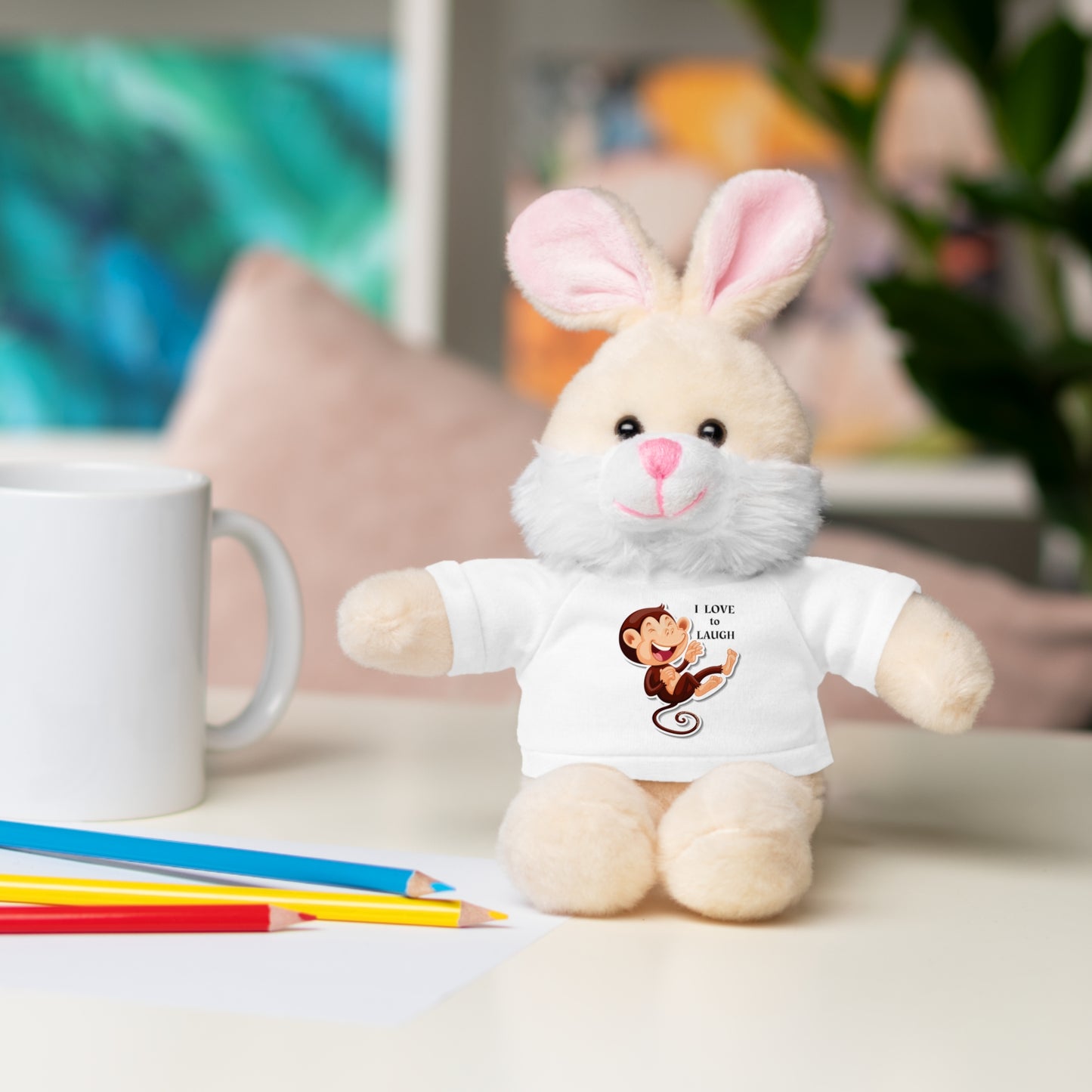 Cool Stuff Stuffies plush toys with 'I Love to Laugh' Monkey t-shirt, featuring six animal options, perfect for snuggling, from Light Passers Marketplace.