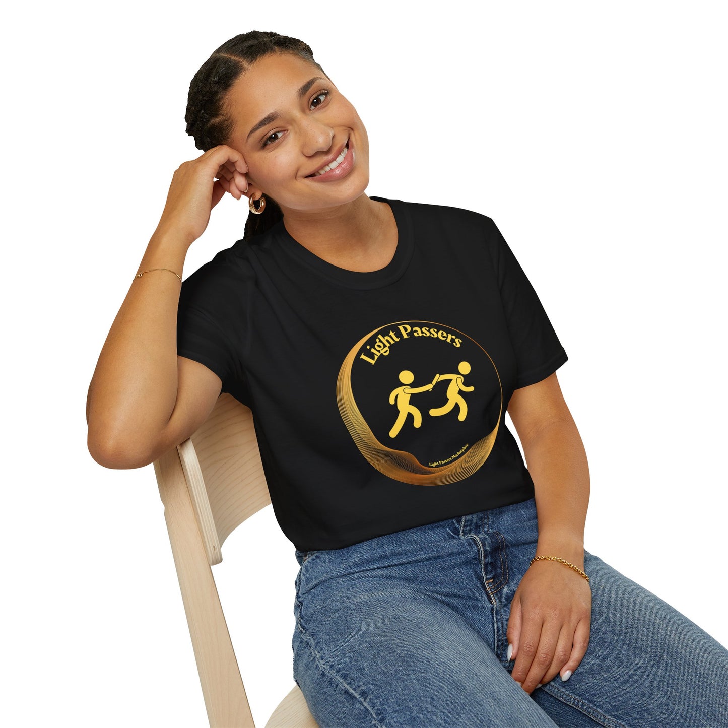 A smiling woman in a black shirt sits on a chair, showcasing Light Passers Relay Logo Unisex T-shirt. The image features a person, clothing, and a human face.