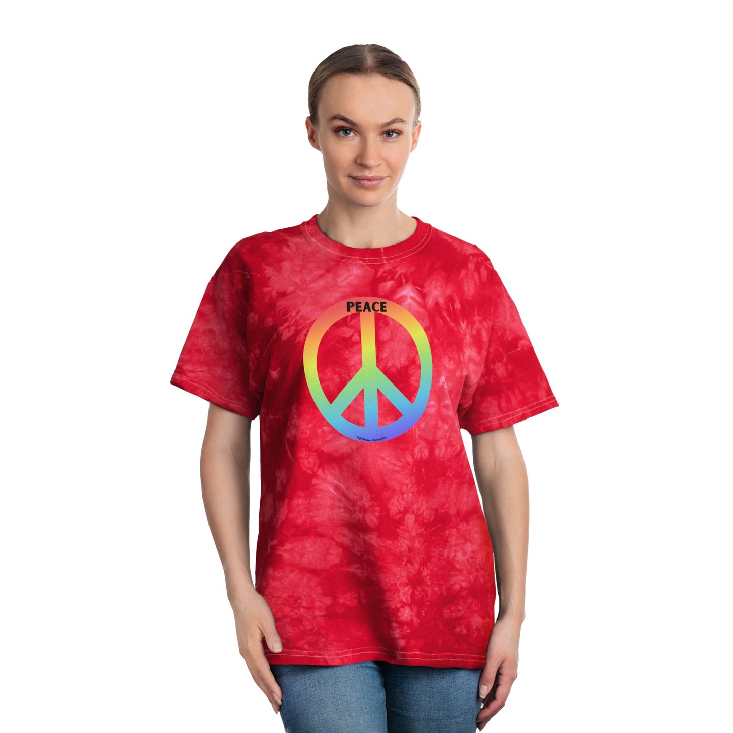 A woman wearing a red tie-dye T-shirt with a rainbow peace symbol and PEACE text, embodying a retro 60s-70s vibe.