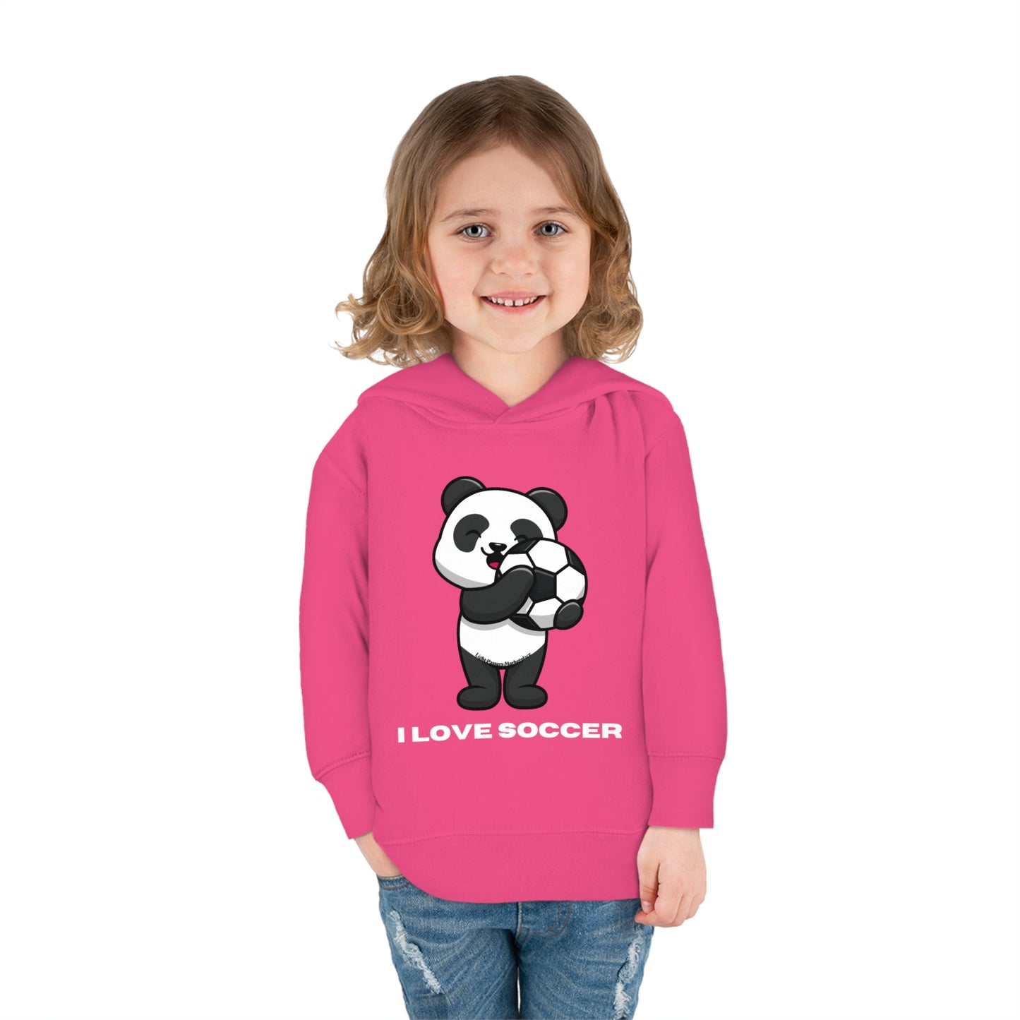 A toddler in a pink hoodie with a cartoon panda holding a football ball design. Features jersey-lined hood, side seam pockets, and durable stitching for lasting coziness.