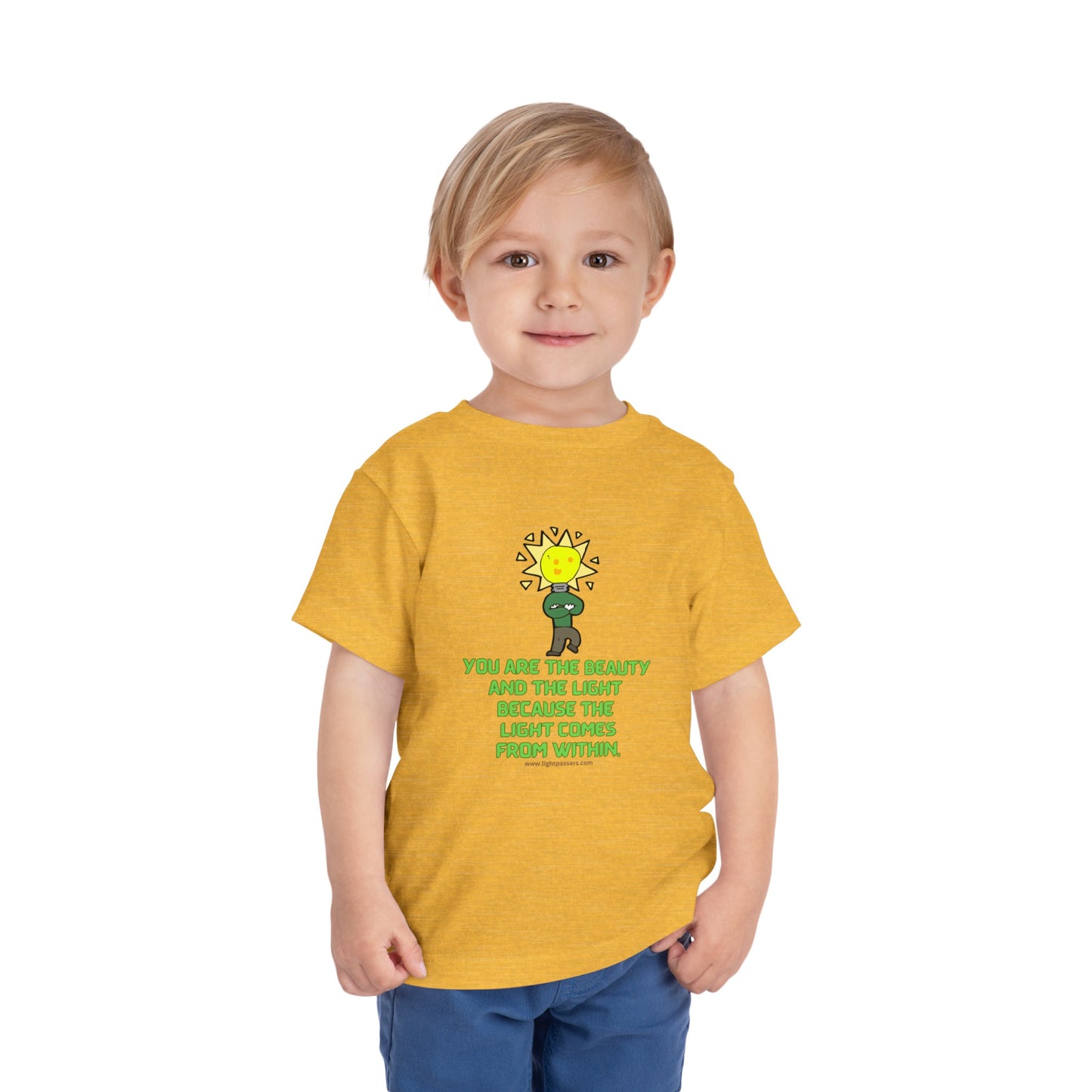 A toddler in a yellow shirt with a cartoon light bulb character. Bella Canvas tee, 100% cotton, tear-away label, light fabric.