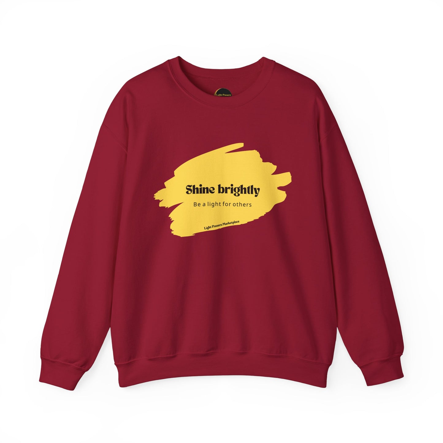 The Light Inspirational Crewneck Sweatshirt features a cozy design with yellow text, perfect for spreading positivity and warmth.