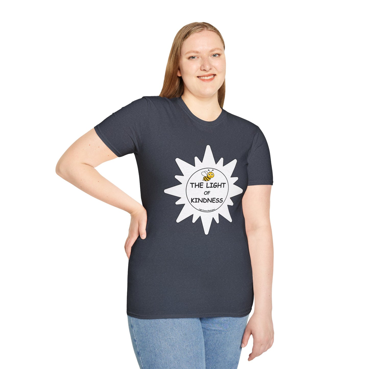 A woman in a white star Unisex T-shirt, smiling, showcasing the casual tee's logo. Close-up of blue jeans. Clothing tags: t-shirt, jeans. Product: BEE the Light of Kindness tee.