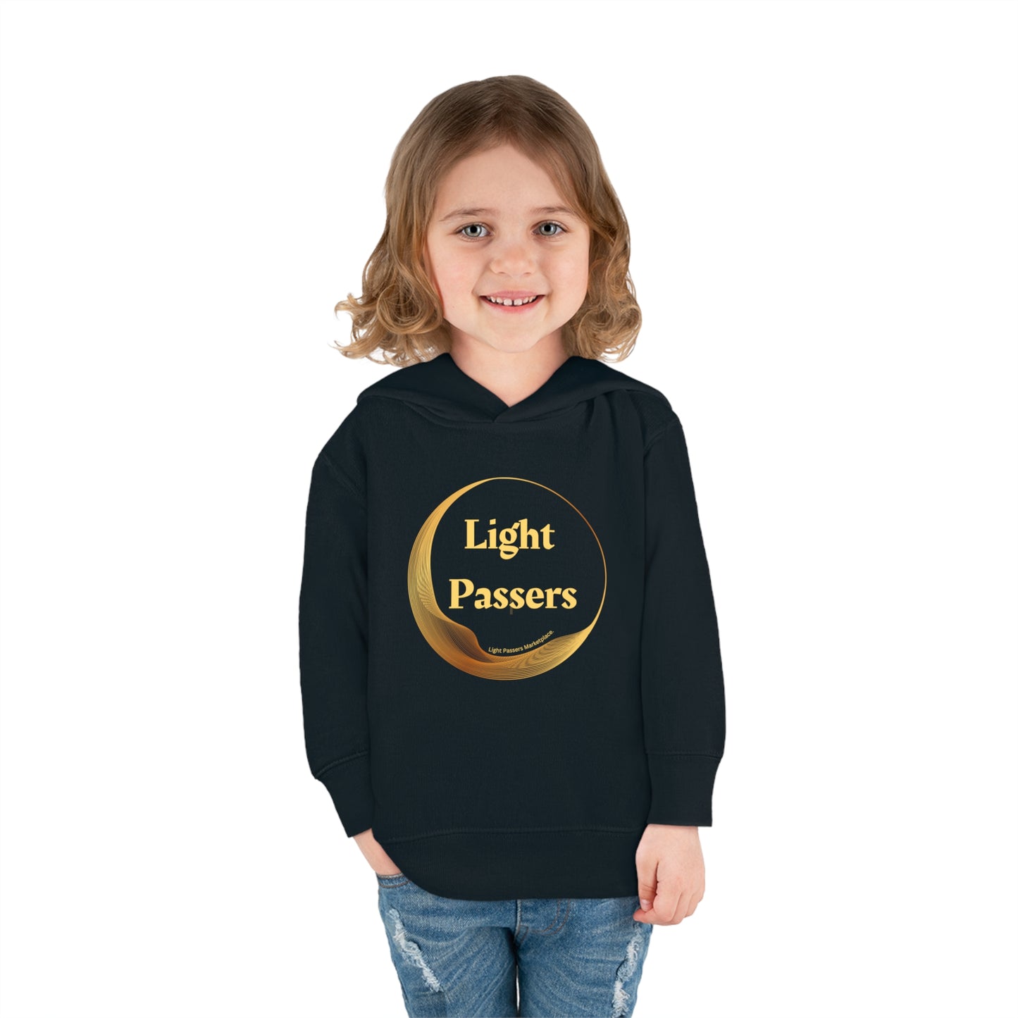 A child in a black Rabbit Skins toddler hoodie with a logo, smiling at the camera. Features jersey-lined hood, cover-stitched details, side seam pockets for cozy comfort.
