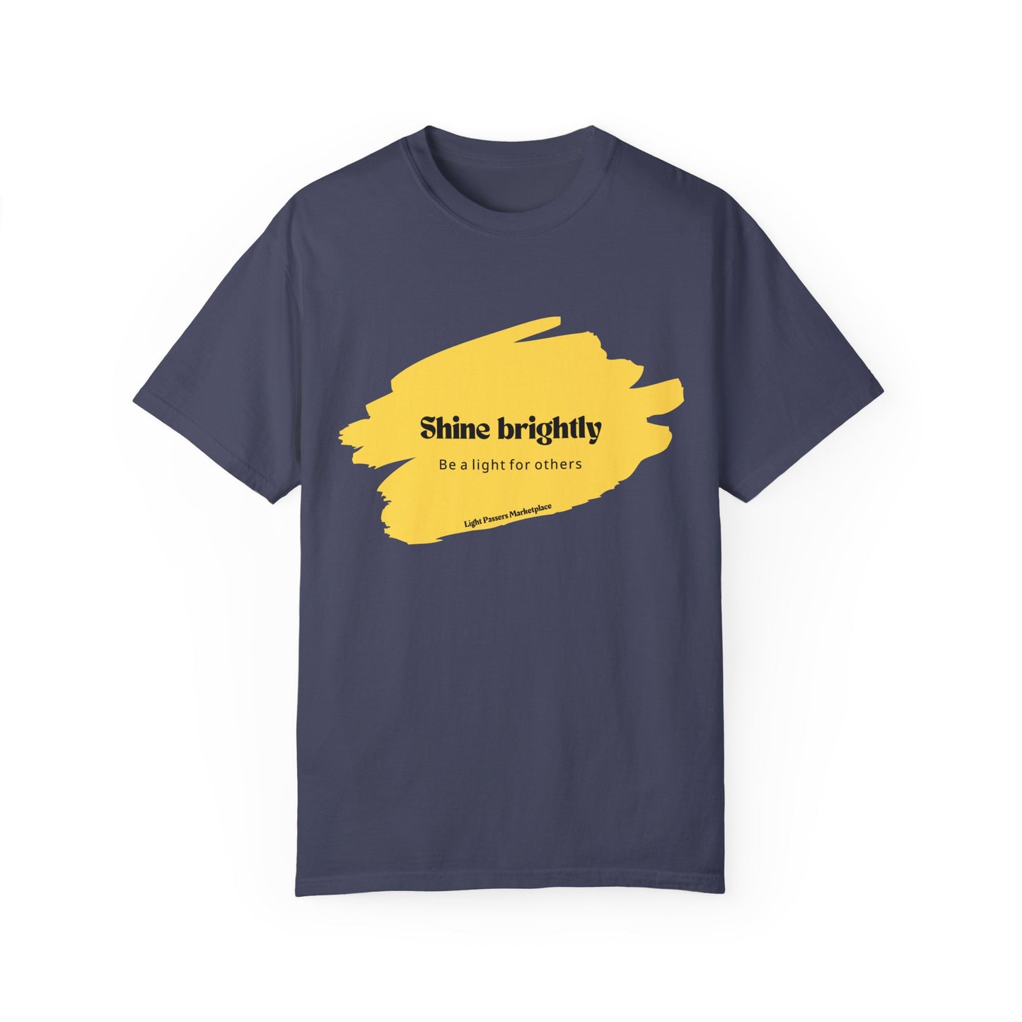 The Light Shine Brightly for Others Inspirational Design Adult Unisex T-shirt, showcasing a yellow text and paint design on a relaxed-fit, ethically-sourced cotton fabric.
