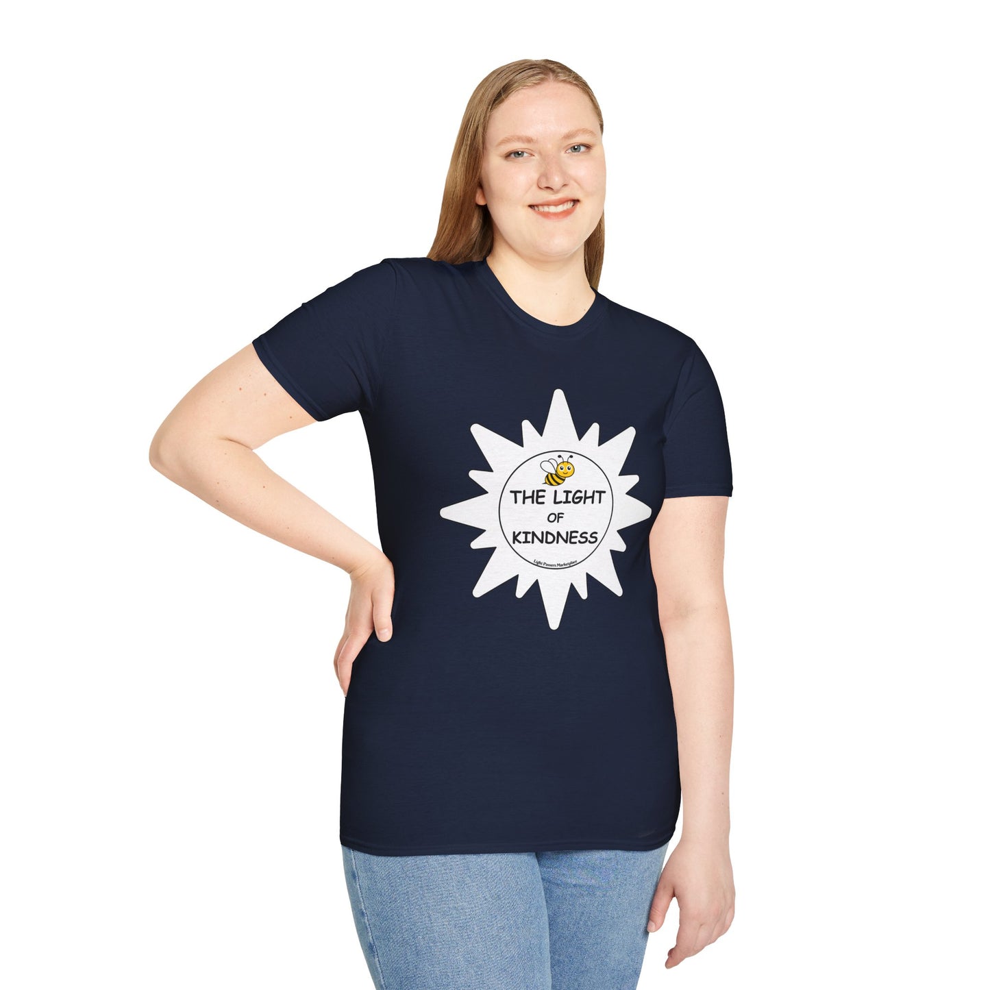 A woman in a blue shirt smiles, showcasing a t-shirt with a logo. Close-up of jeans. Alt text: BEE the Light of Kindness white star Unisex T-shirt: classic fit, 100% cotton, tear-away label, no side seams.