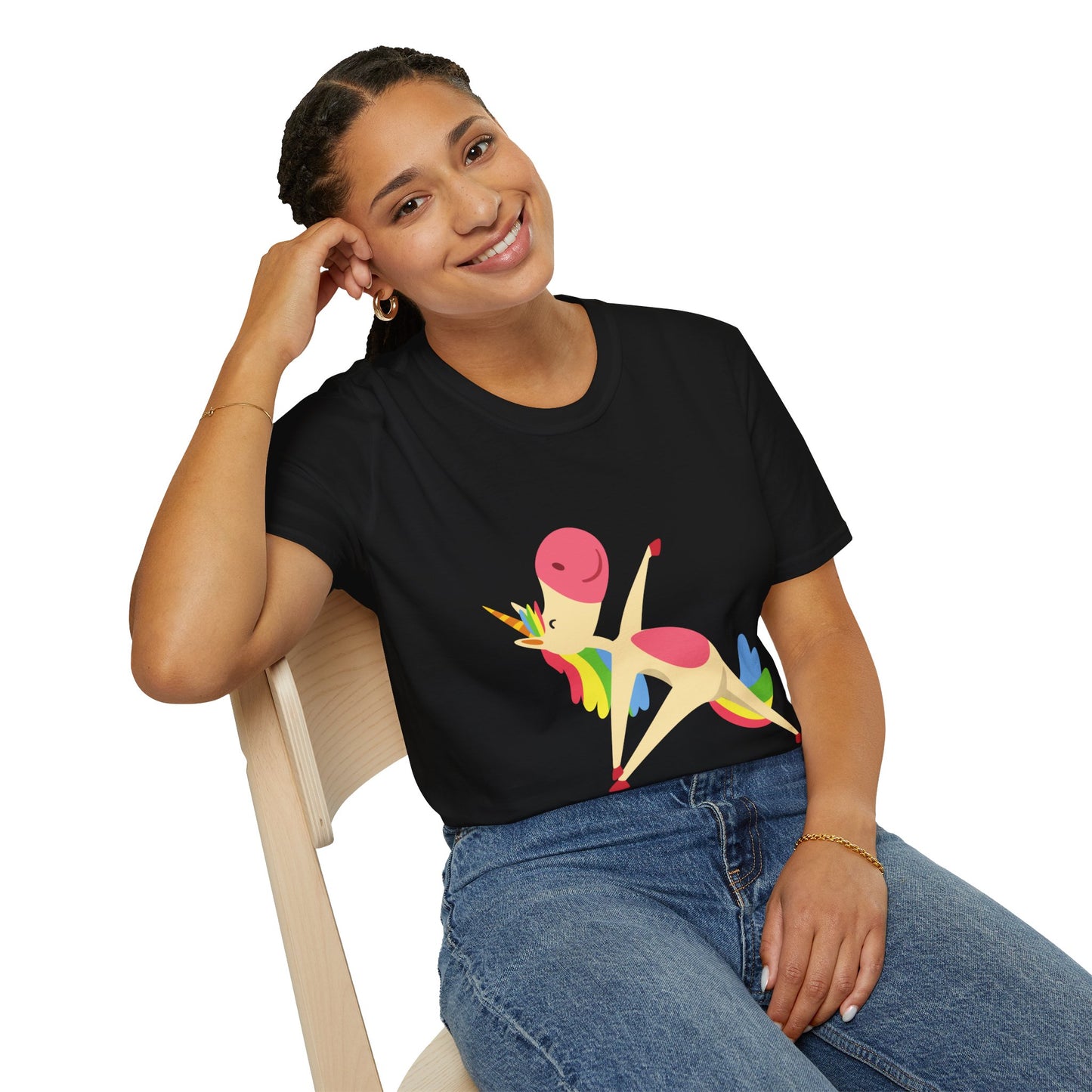 A smiling woman in a black Unicorn Stretch Yoga Unisex T-Shirt, sitting on a chair. Soft 100% cotton tee with twill tape shoulders, no side seams, and ribbed collar. Ethically made.
