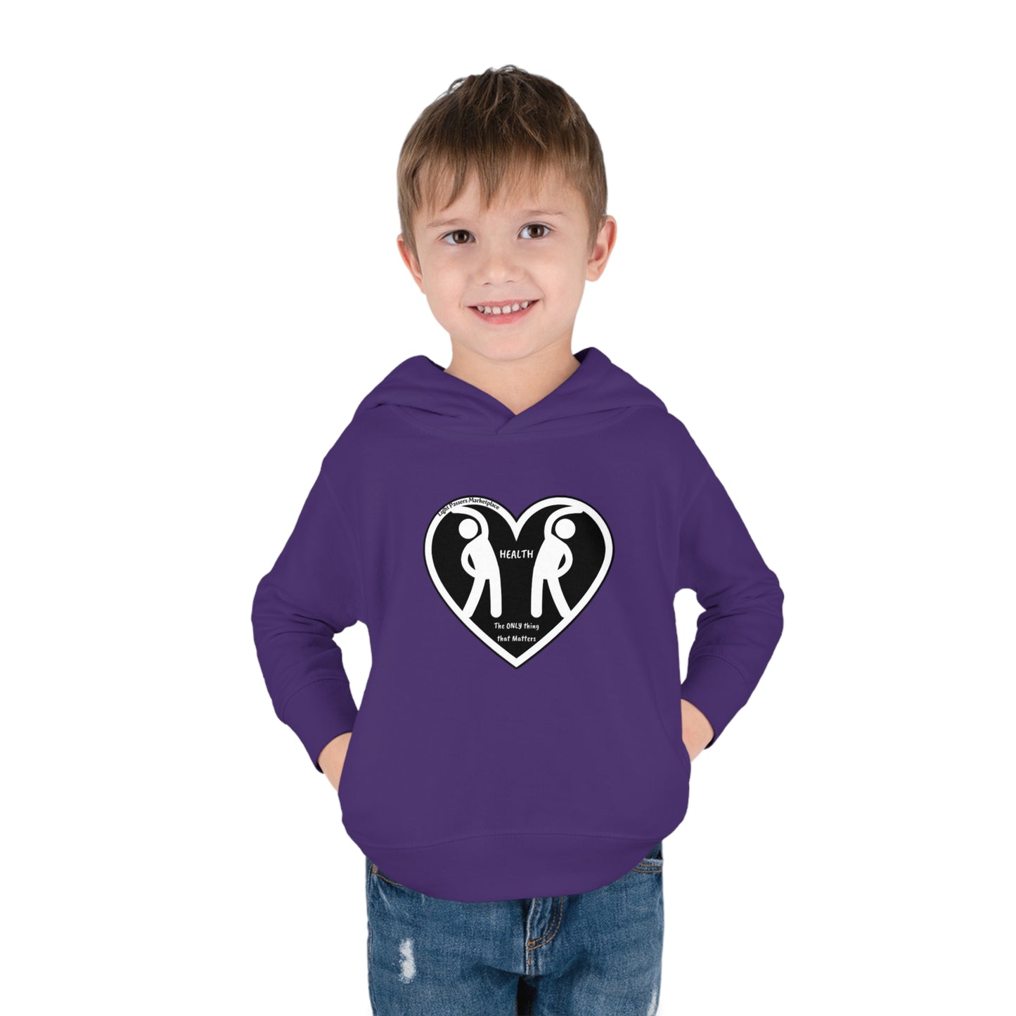 A boy in a purple hoodie with heart figures design, hands in pockets, and close-up details like face and pants. Designed for kids' comfort and play with 60% cotton, 40% polyester blend, side-seam pockets, and EasyTear™ label.