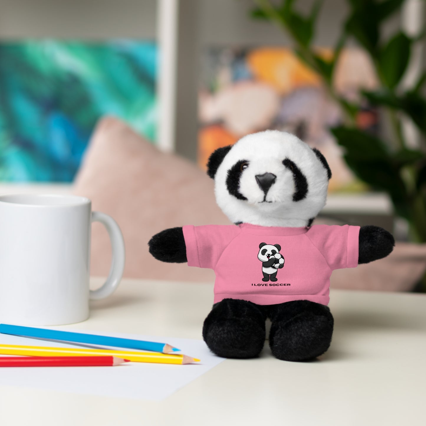 Panda Stuffed Animal with I Love Soccer Shirt, featuring a plush panda in a soccer-themed shirt, ideal for children aged 3 and up.