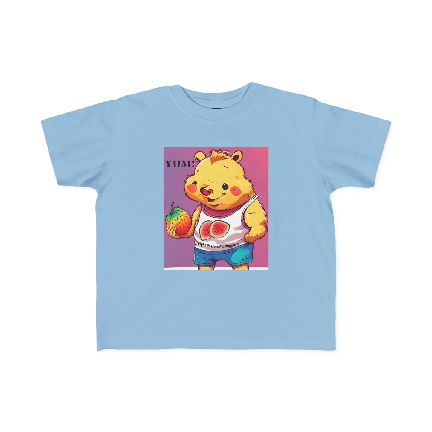 A toddler's tee featuring a cartoon bear holding fruit, ideal for sensitive skin. Made of 100% combed cotton, light fabric, tear-away label, and a durable print.