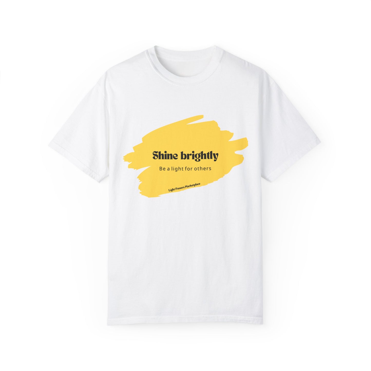 The Light Shine Brightly for Others Inspirational Design Adult Unisex T-shirt features a relaxed fit with yellow paint stroke and text on a white background.