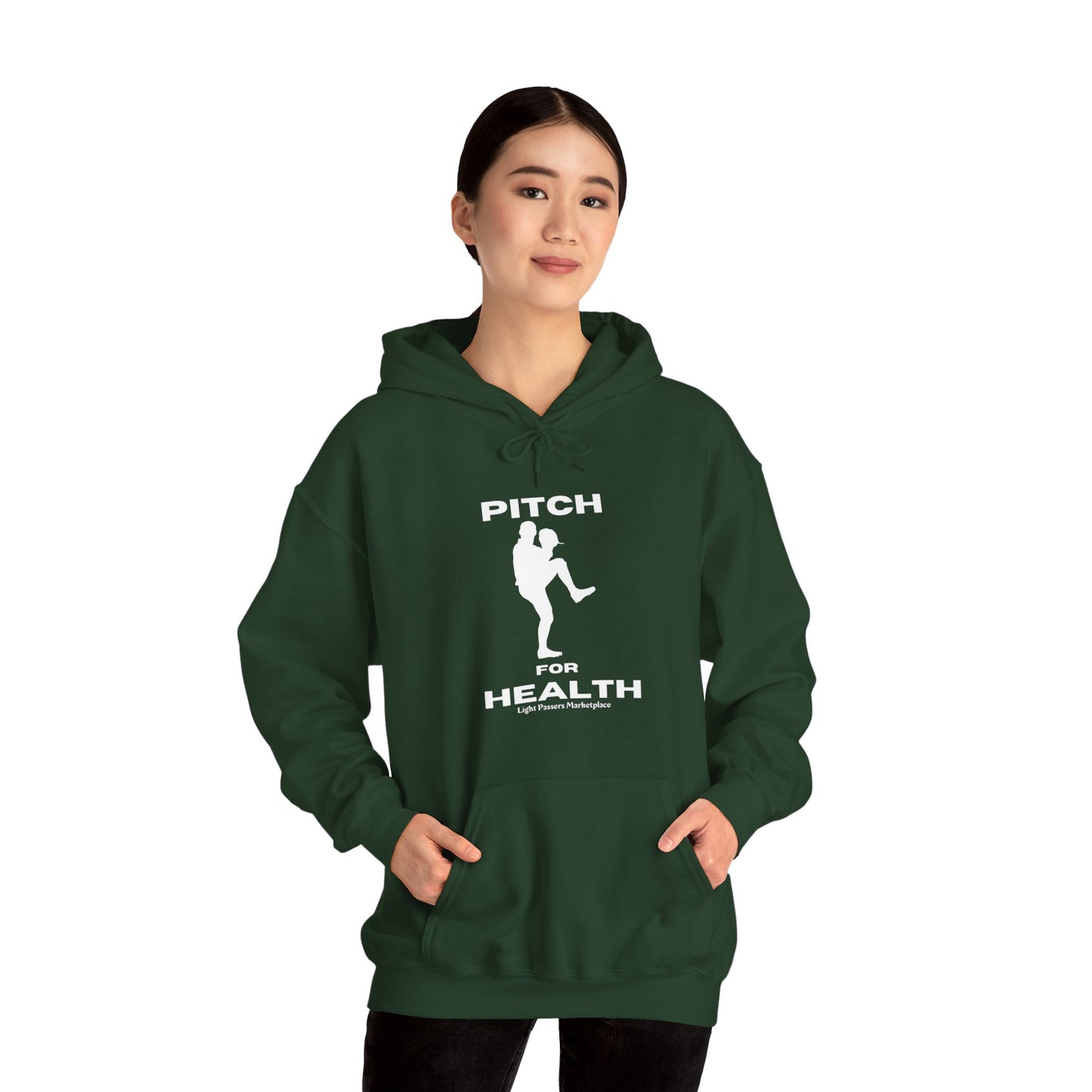 A person in a green hooded sweatshirt with a baseball player design, showcasing a kangaroo pocket and color-matched drawstring. Made of cotton-polyester blend for warmth and comfort.