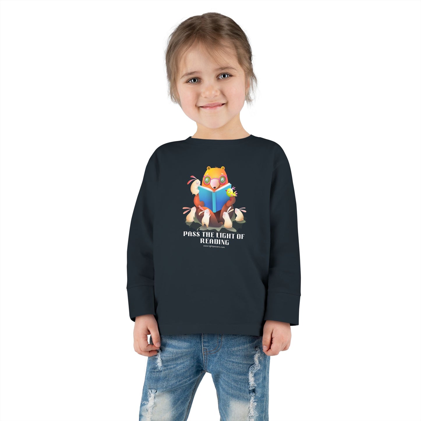 Toddler Long Sleeve Pass the Light of Reading tee featuring a bear reading with bunnies, crafted from soft cotton for comfort and durability.